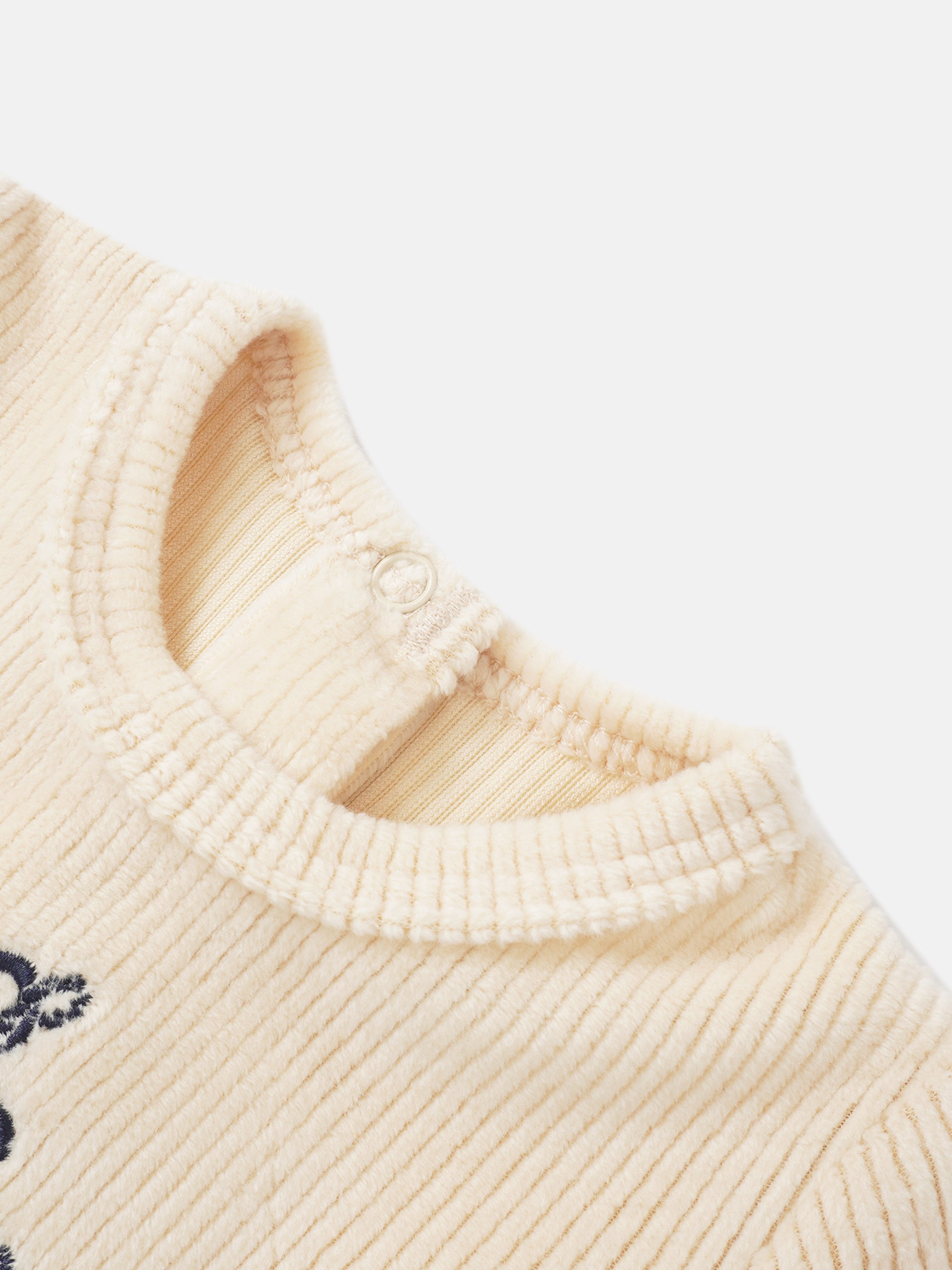 Adee Embroidered Anchor Stretchy for boys; cream fleece-knit with navy anchor embroidery.