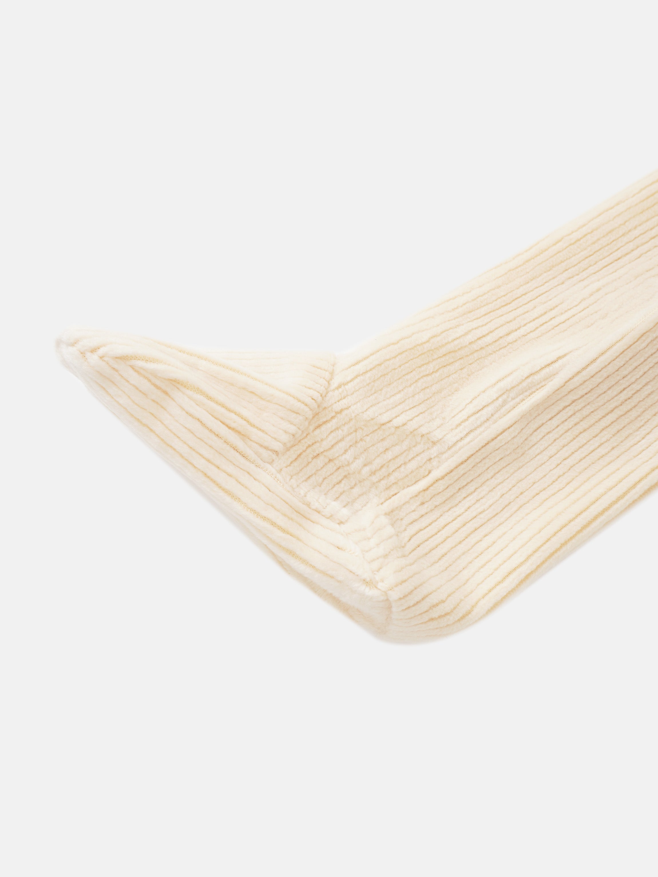 Boys Stretchies in cream ribbed knit fabric, close-up cuff view