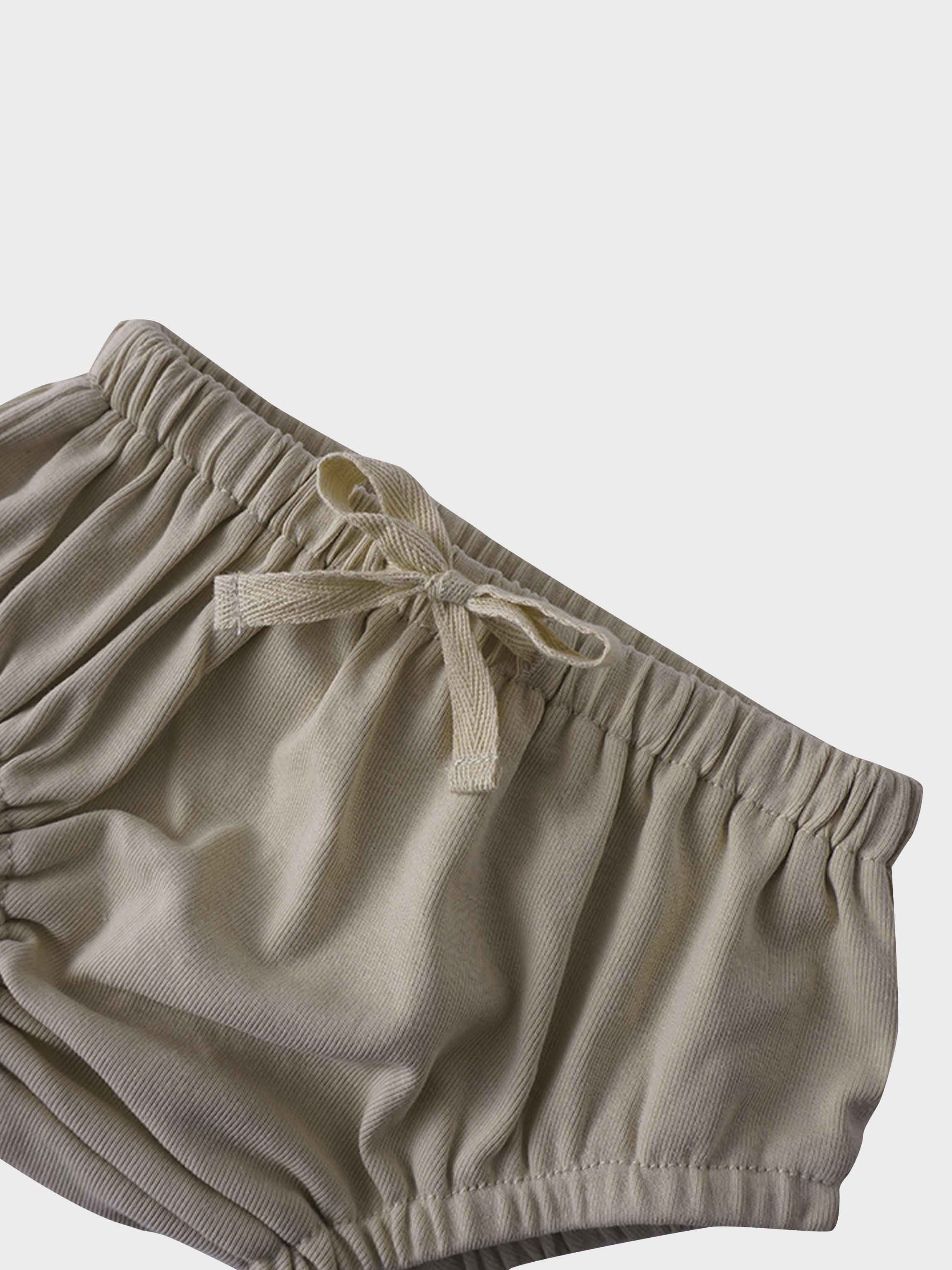 Light tan drawstring bloomers close-up