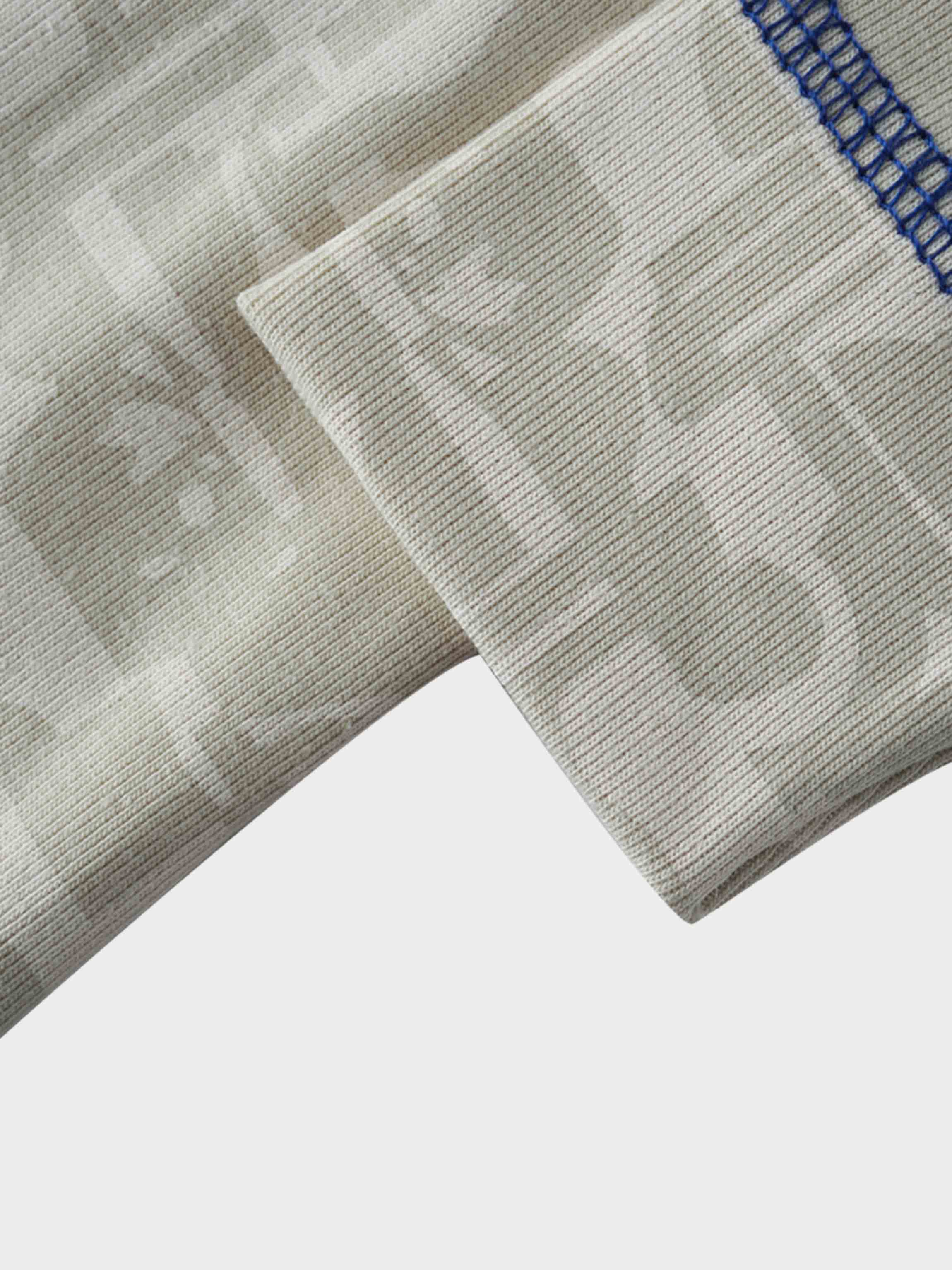 Abstract beige pattern fabric detail