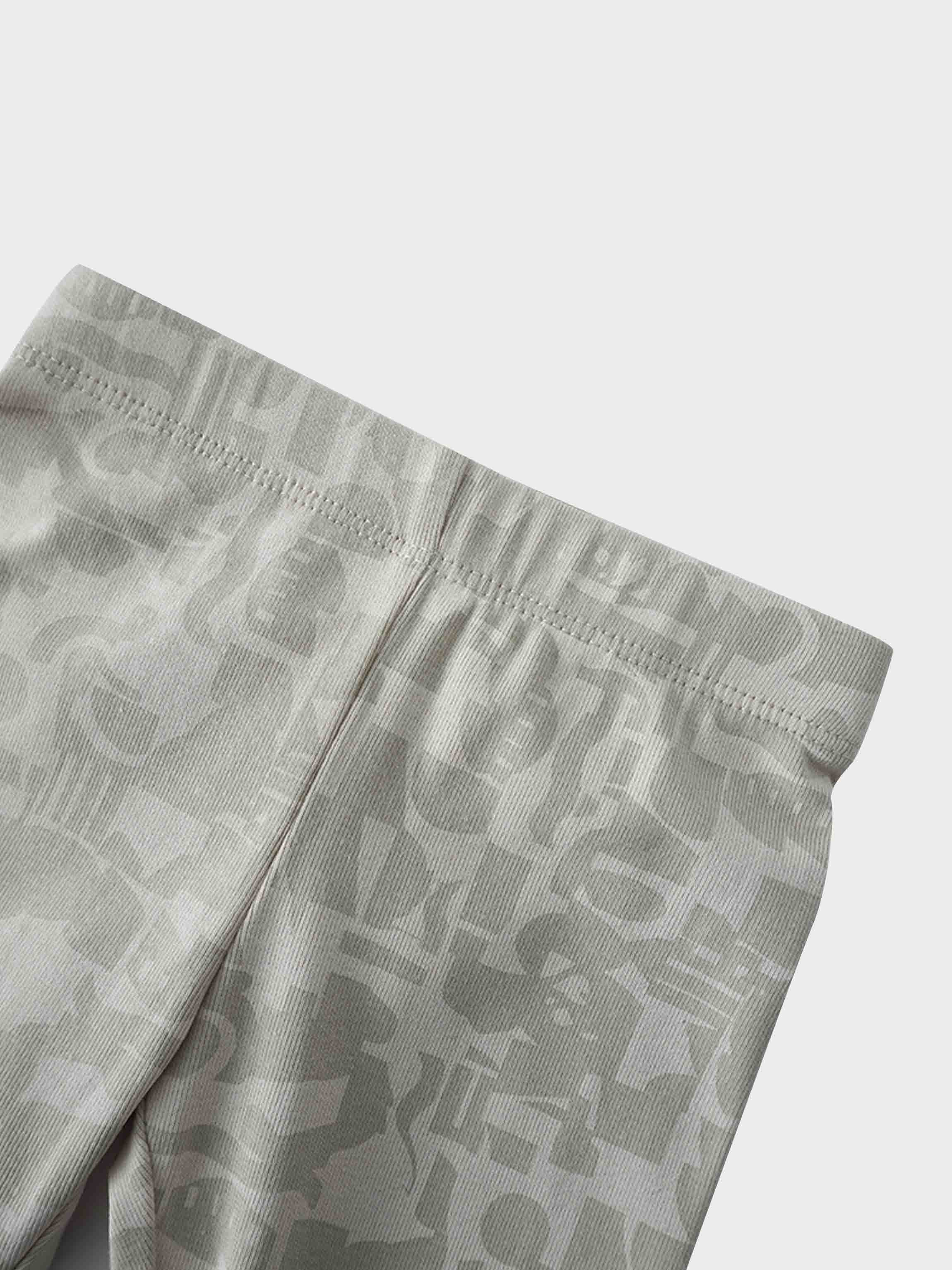 Backdrop of beige pajama pants