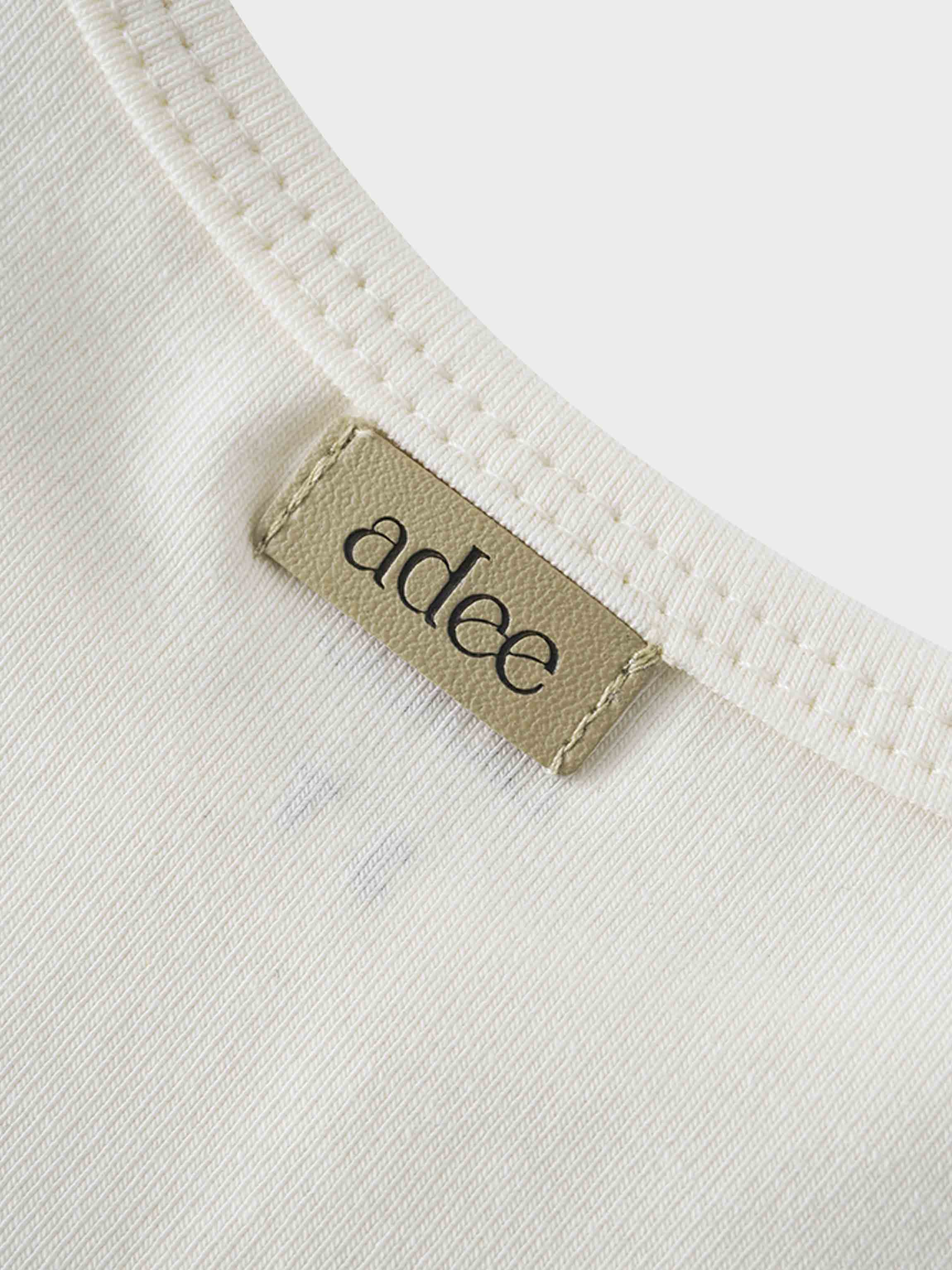 Close-up of Adee brand tag