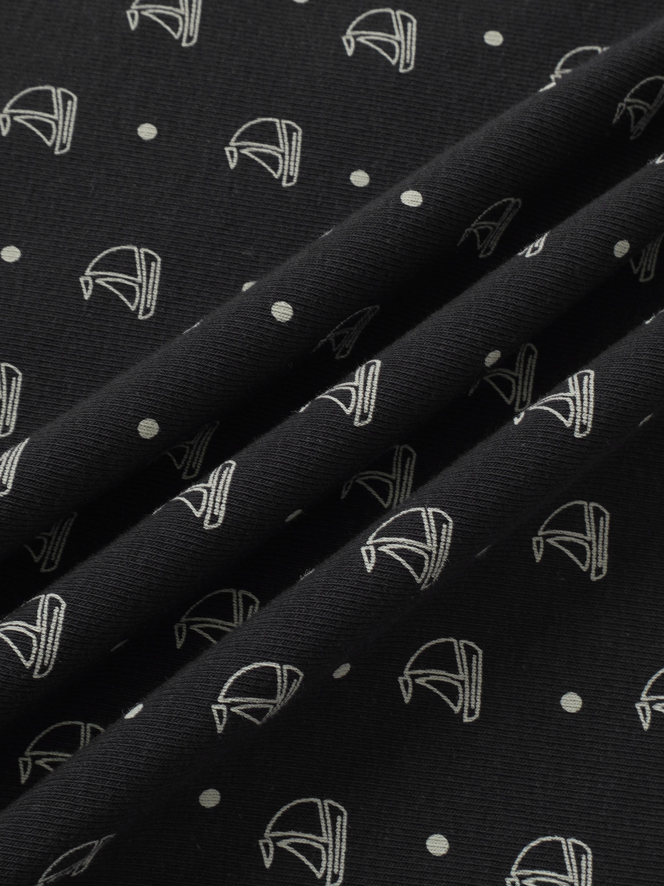 Harbor Dot Blanket, navy fabric with white stroller-outline prints and dots.