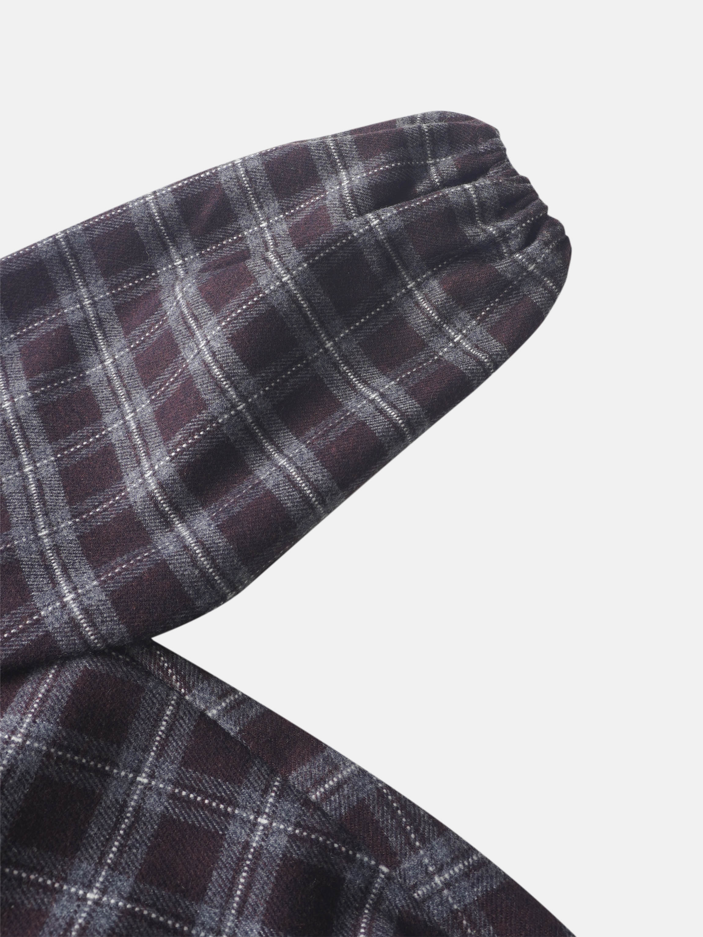Plaid burgundy fabric close-up for girls&