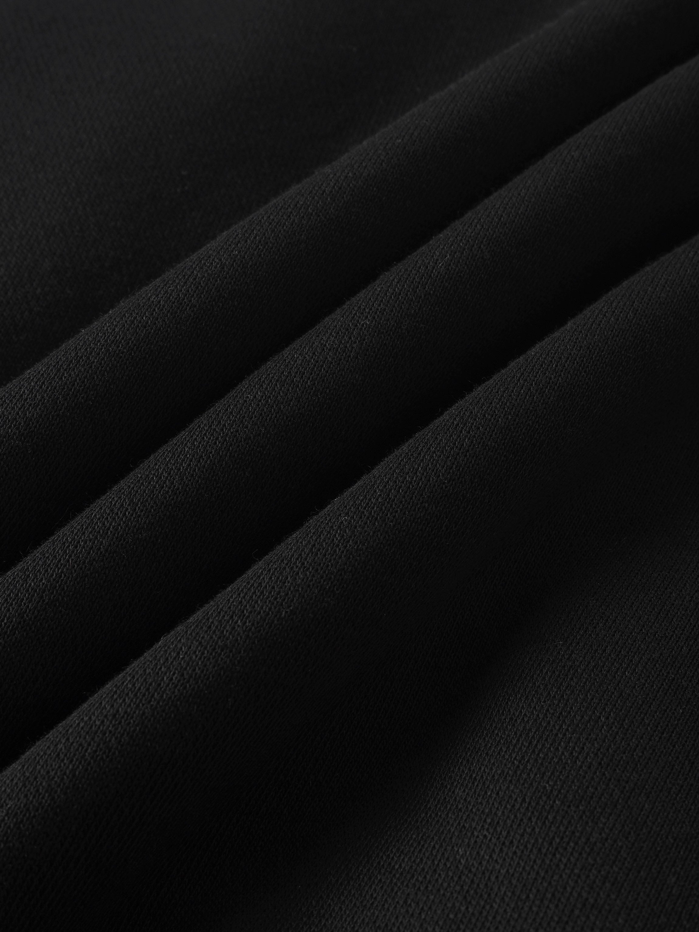 Fur Lined Sweatshirt by Adee in black; close-up of soft knit fabric.