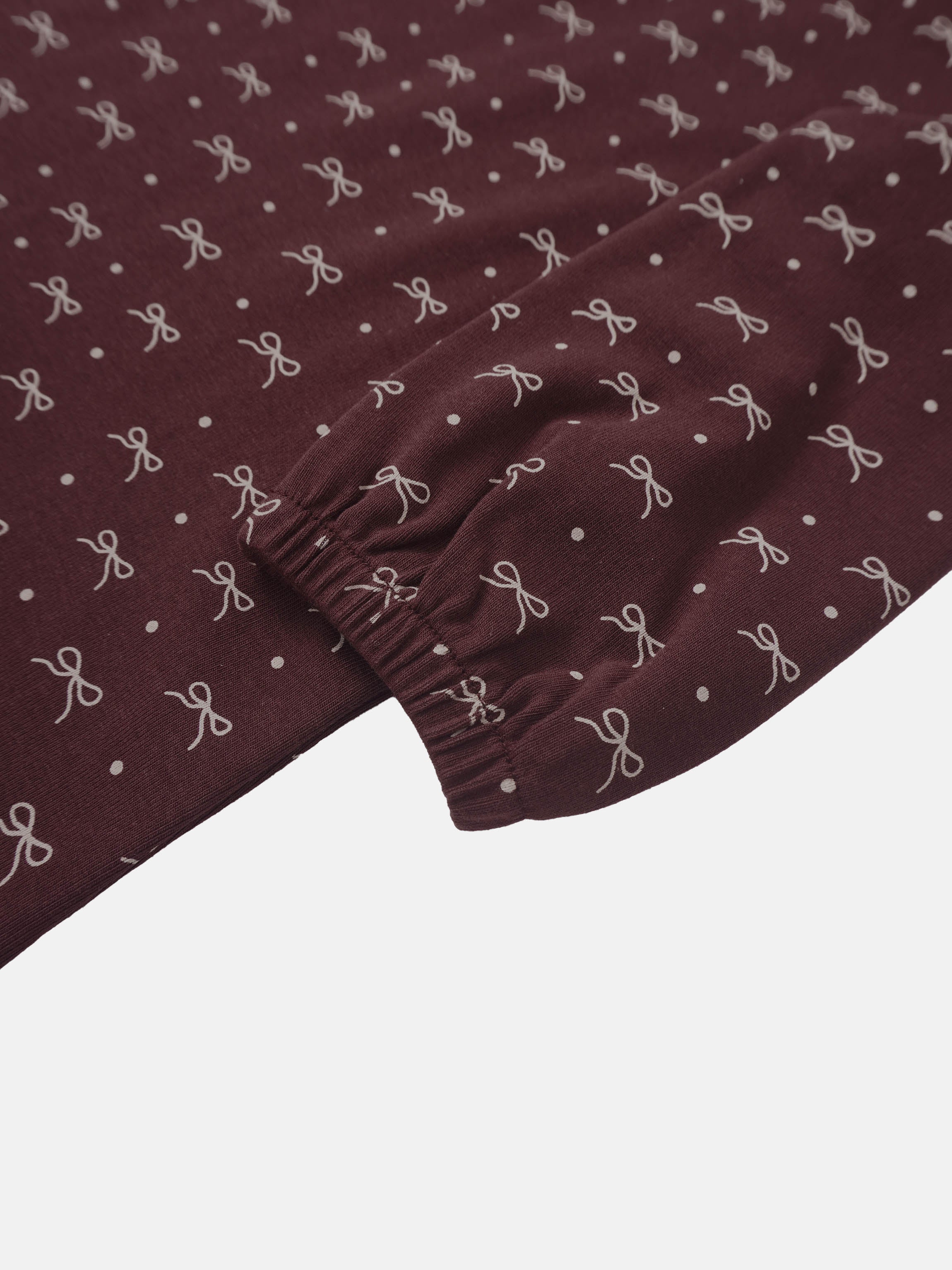 Burgundy Bow T-Shirt for girls by Adee; long-sleeve top with white bows and polka-dot pattern.