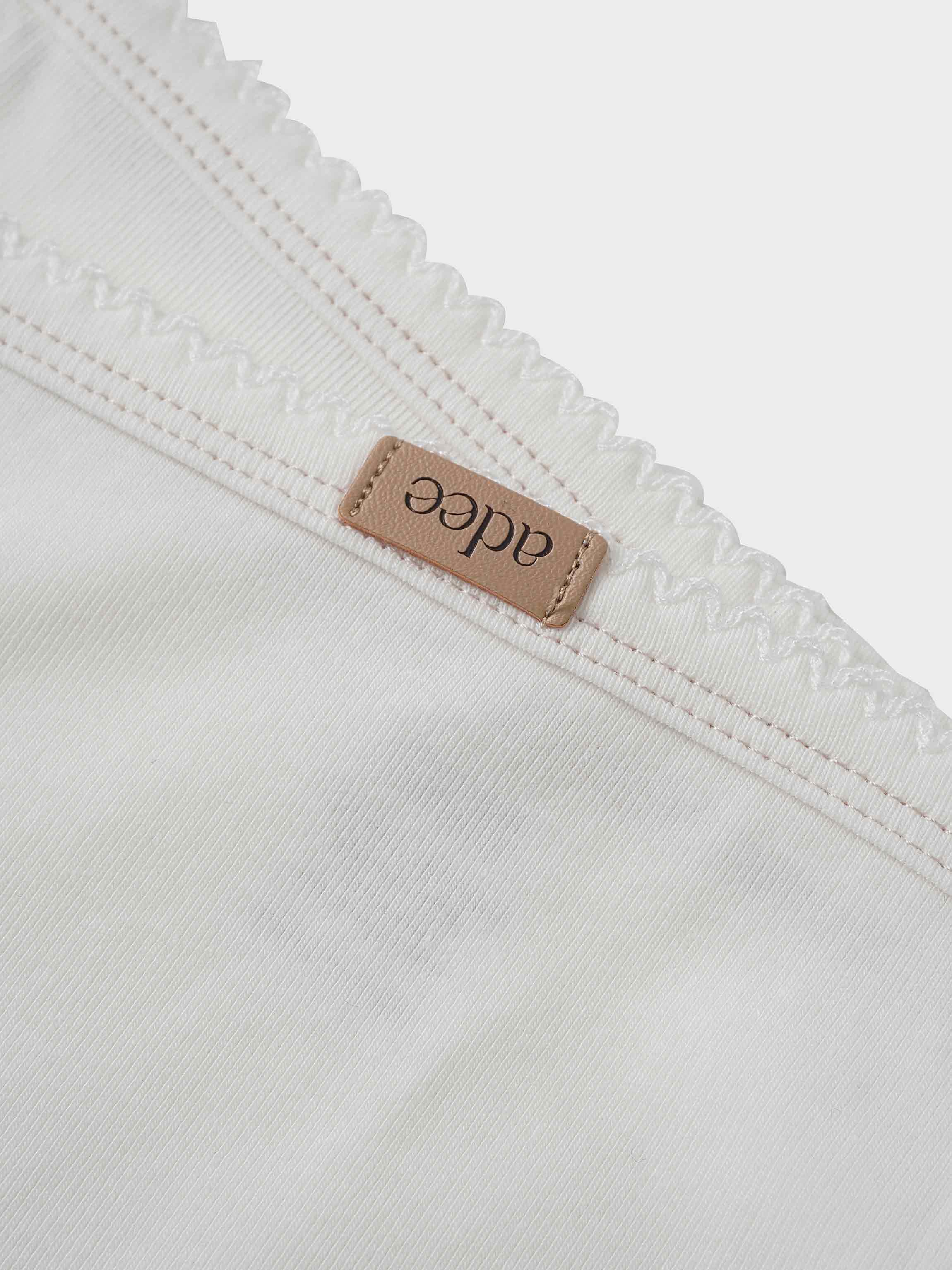 Mini Gallery Blanket Pink by Adee; girls swaddle receiving blanket with scalloped edge and leather brand tag.