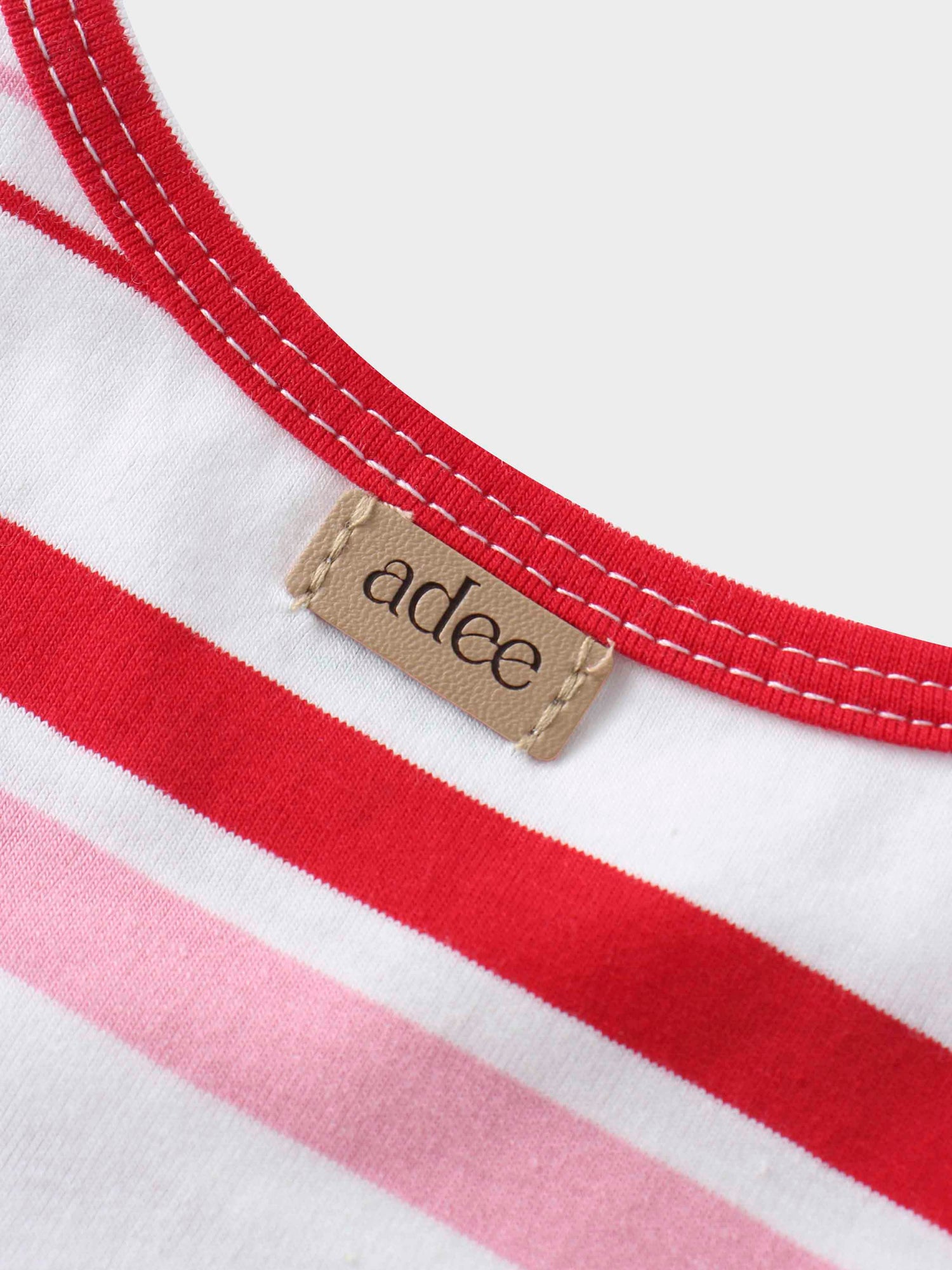 Pink and red striped girls shirt collar detail