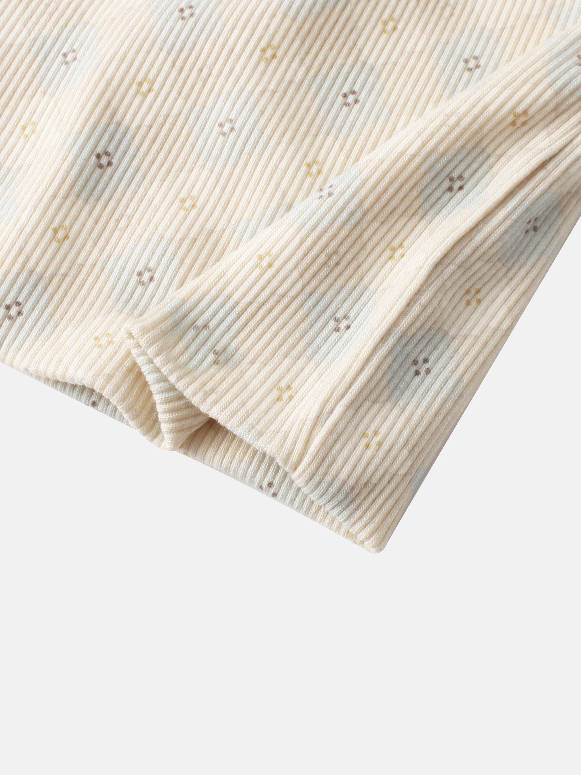 Little Button Beanie for boys in cream rib-knit fabric with tiny yellow and brown floral dots