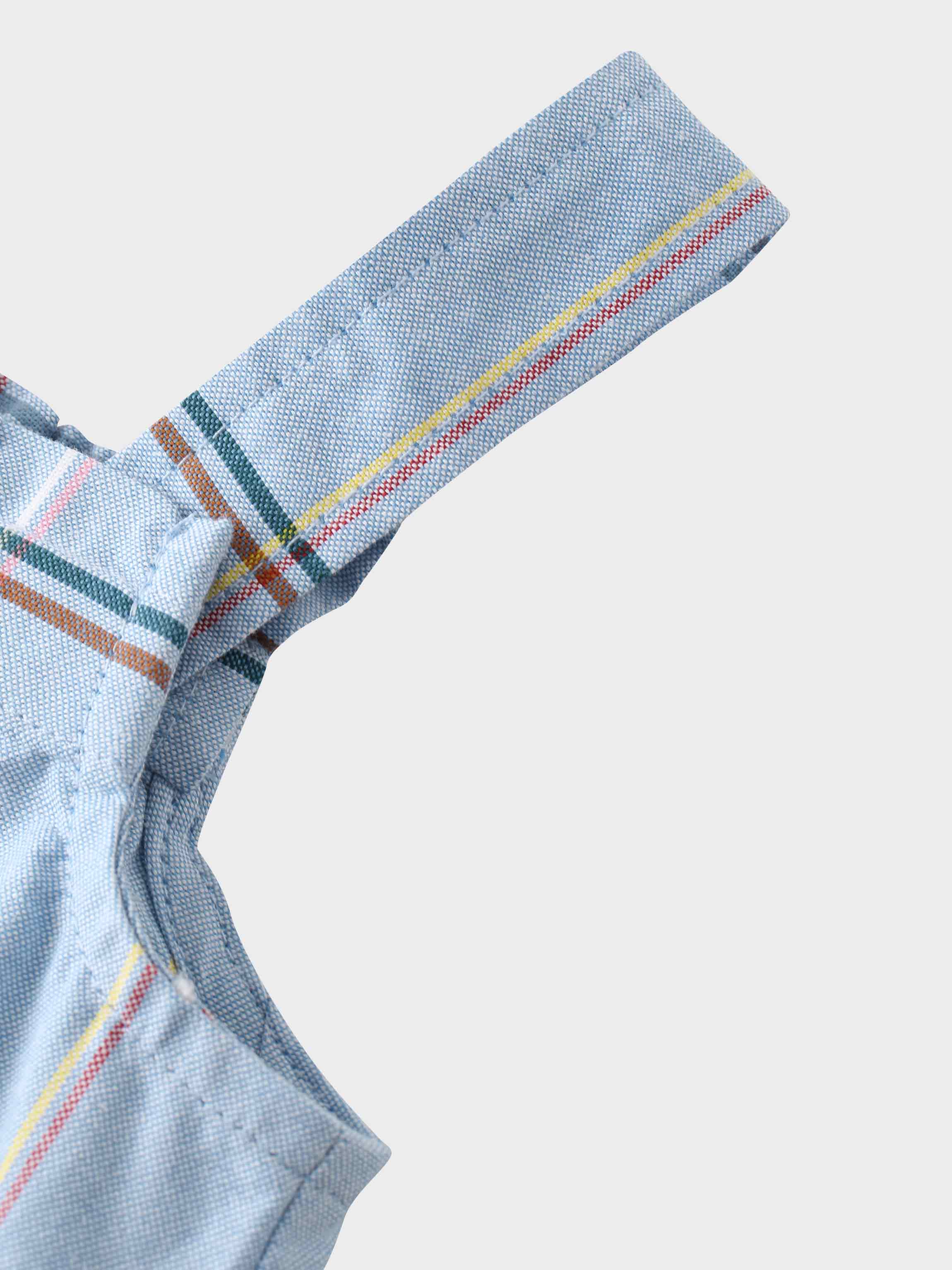 Cotton plaid jumper dress strap close-up