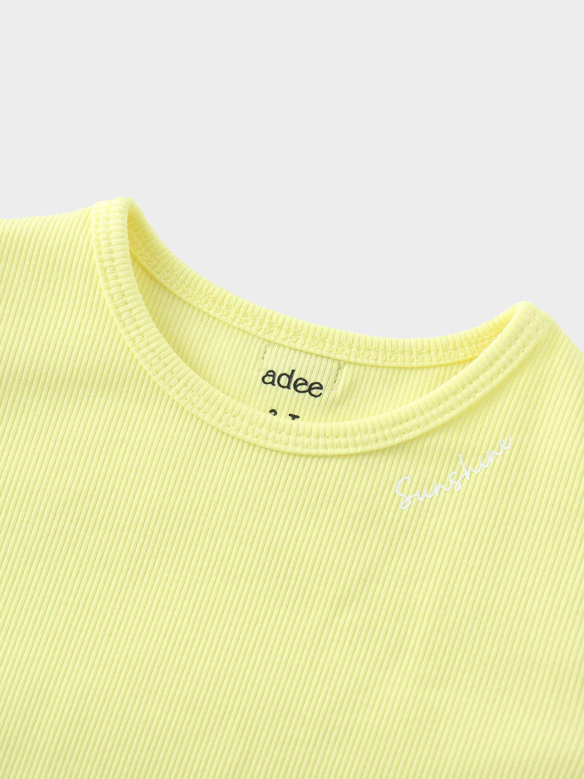 Yellow girls shirt with &