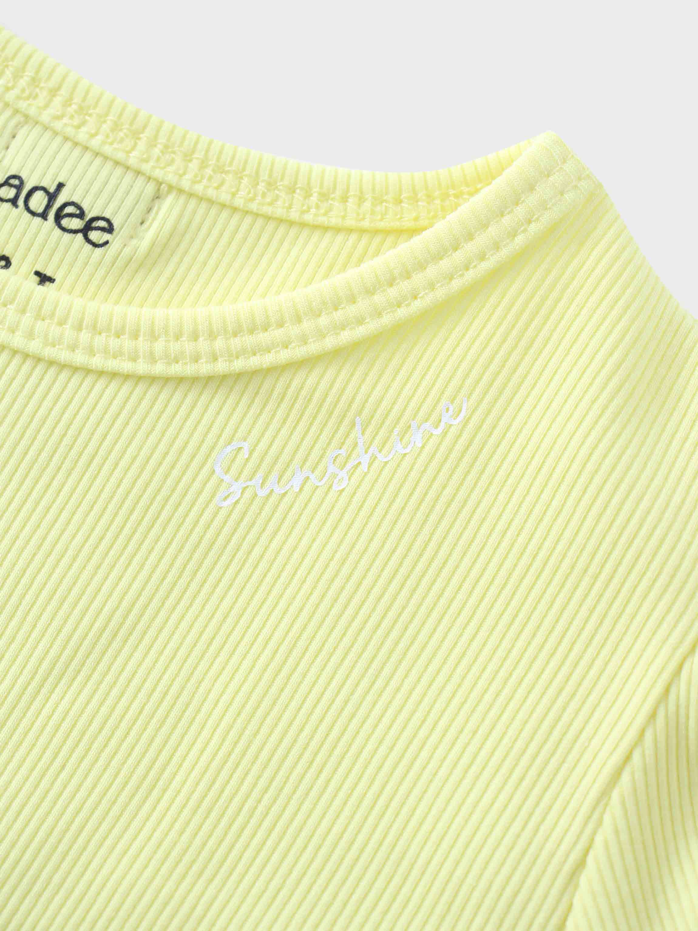 Yellow ribbed shirt with &
