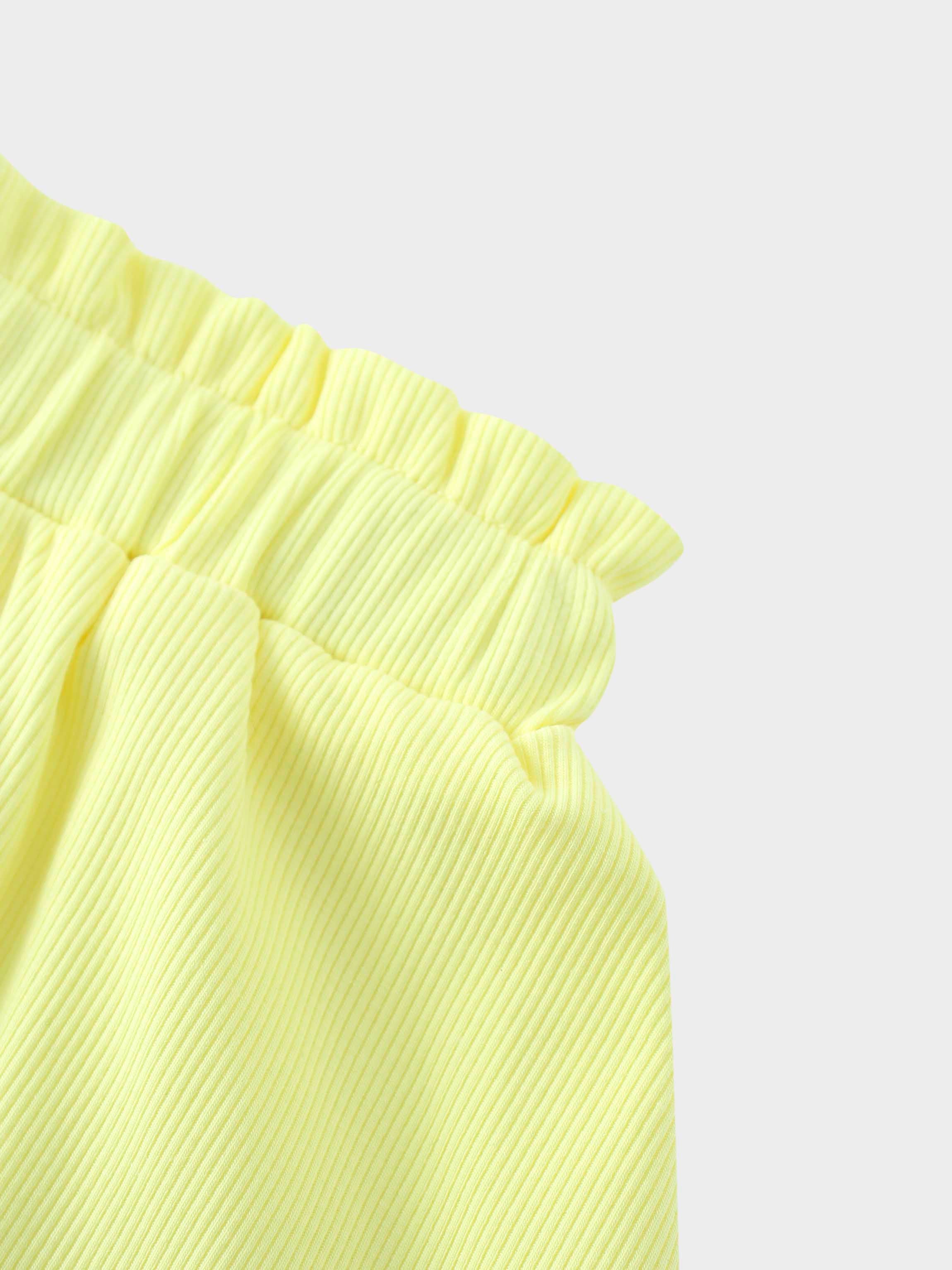Close-up of yellow ribbed skirt girls