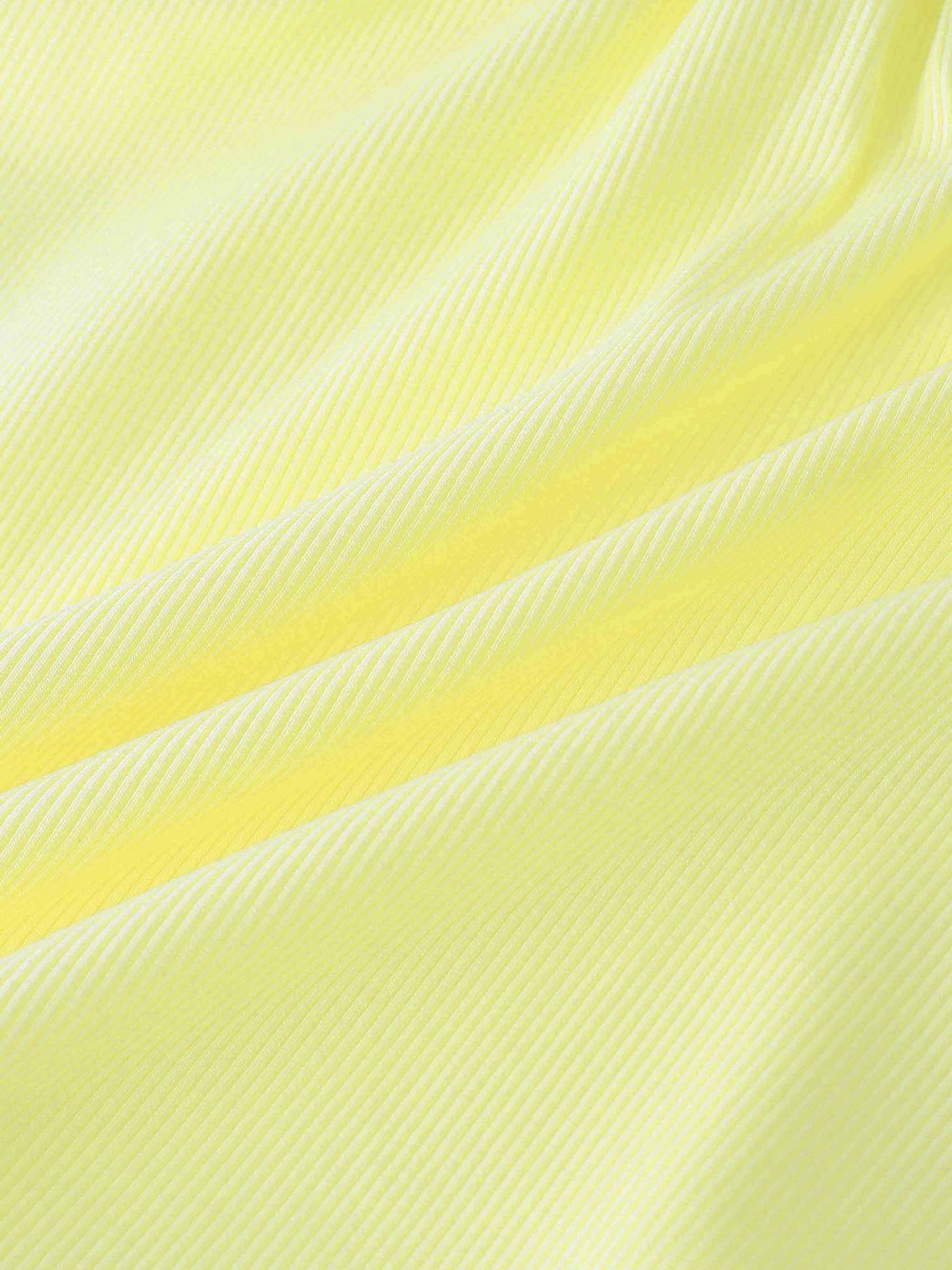 Ribbed yellow fabric close-up for girls