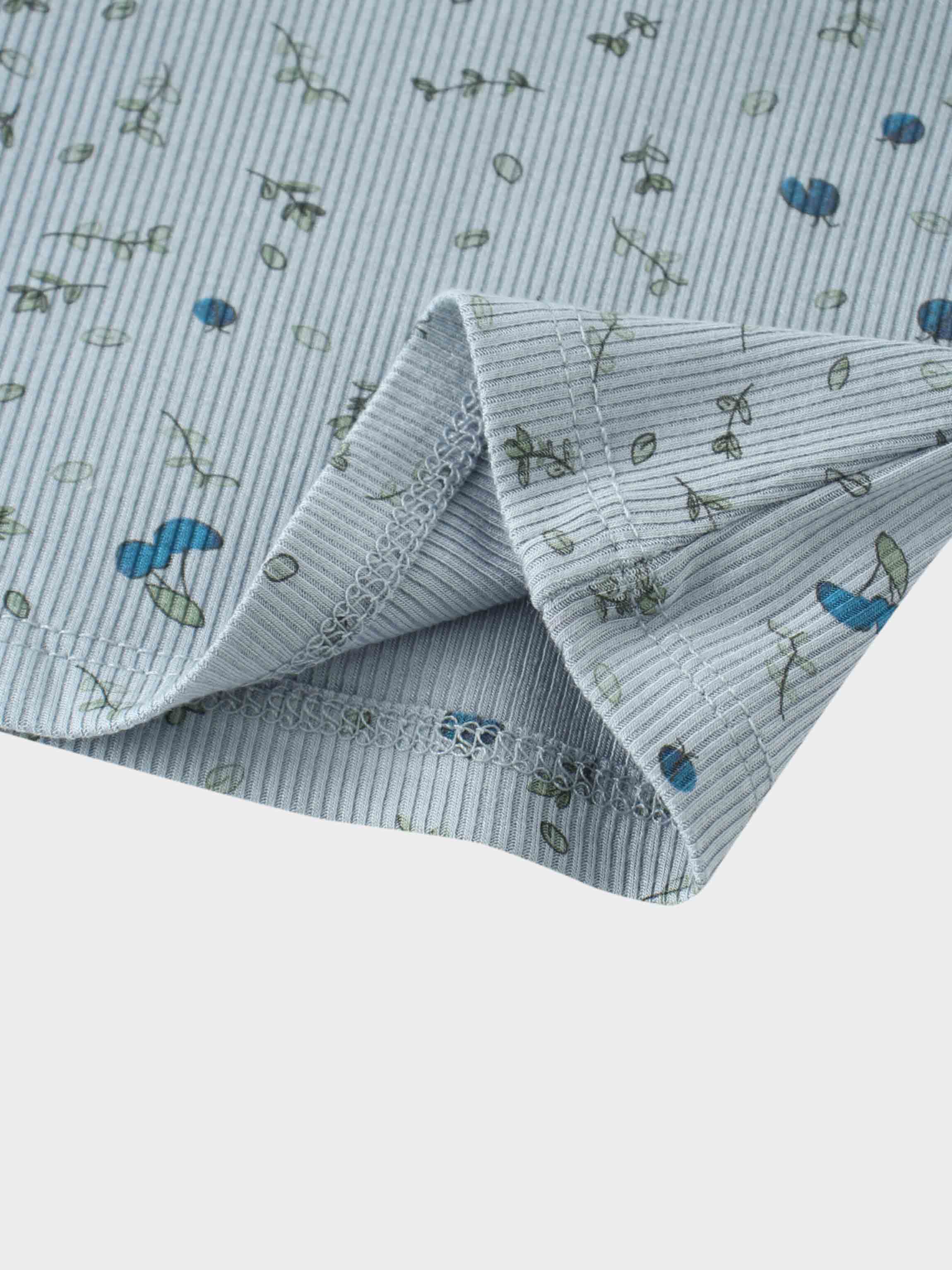 Blue berry pajama fabric close-up