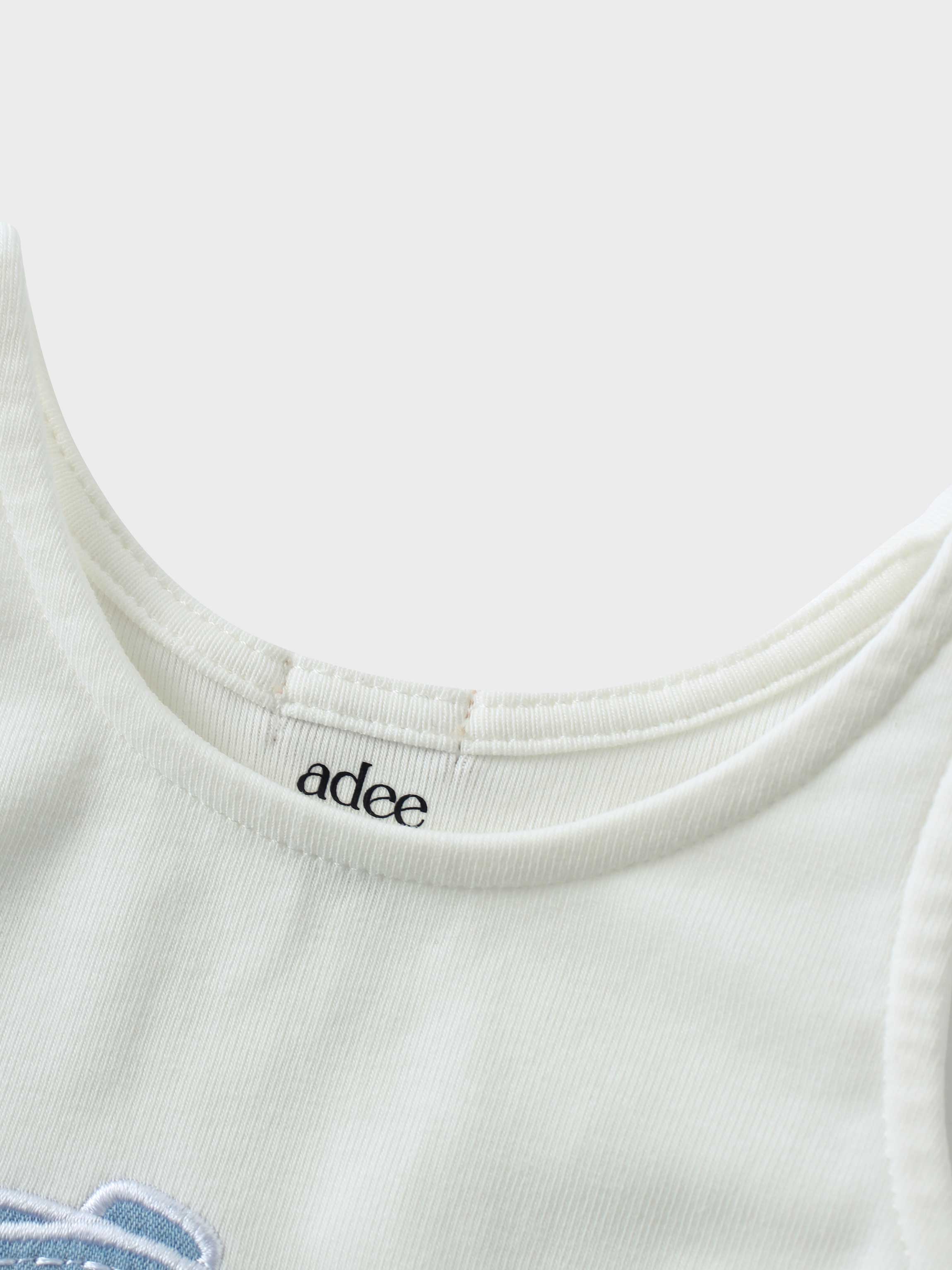 Soft white baby romper neckline