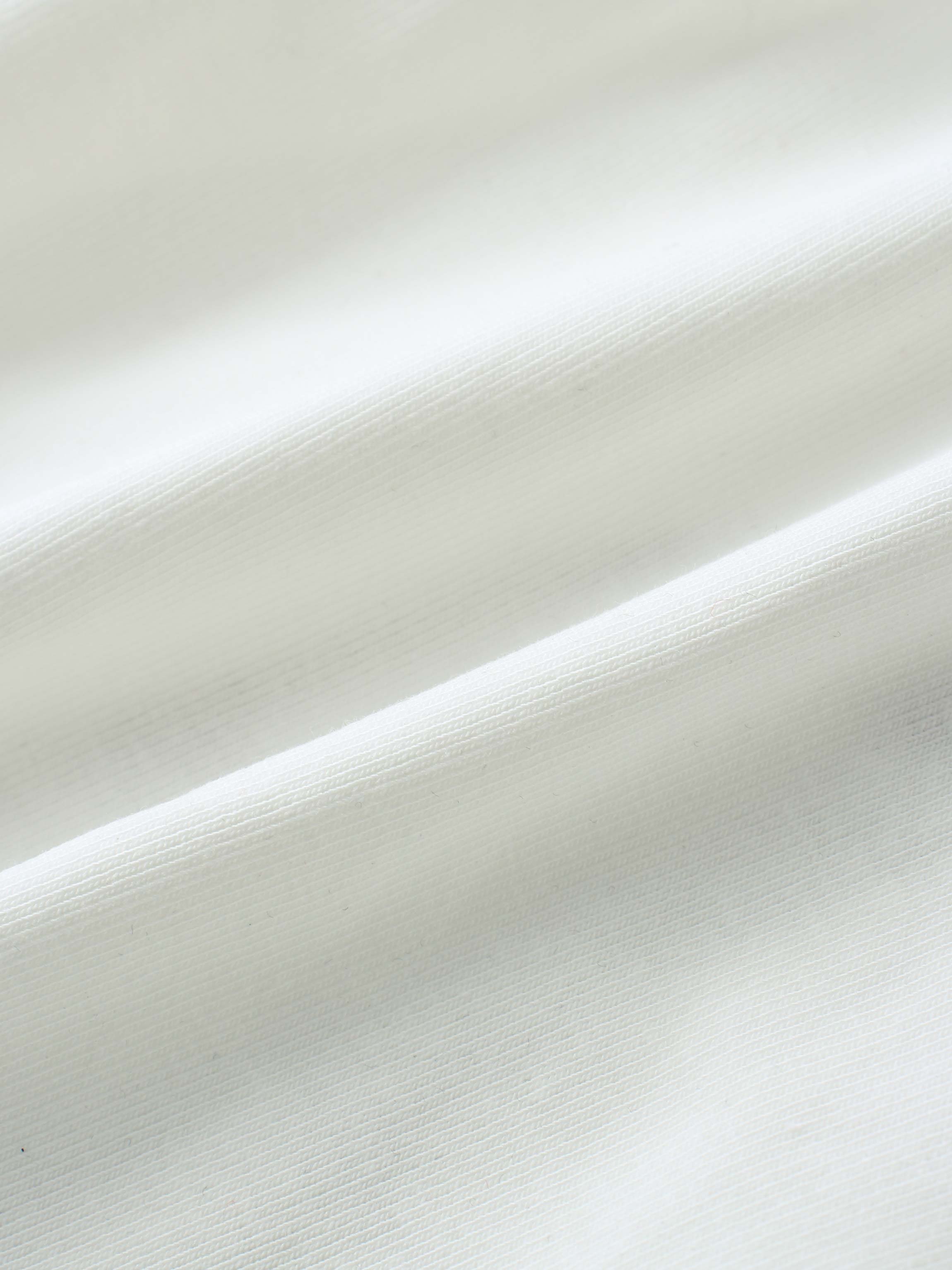 Soft white fabric texture for baby romper