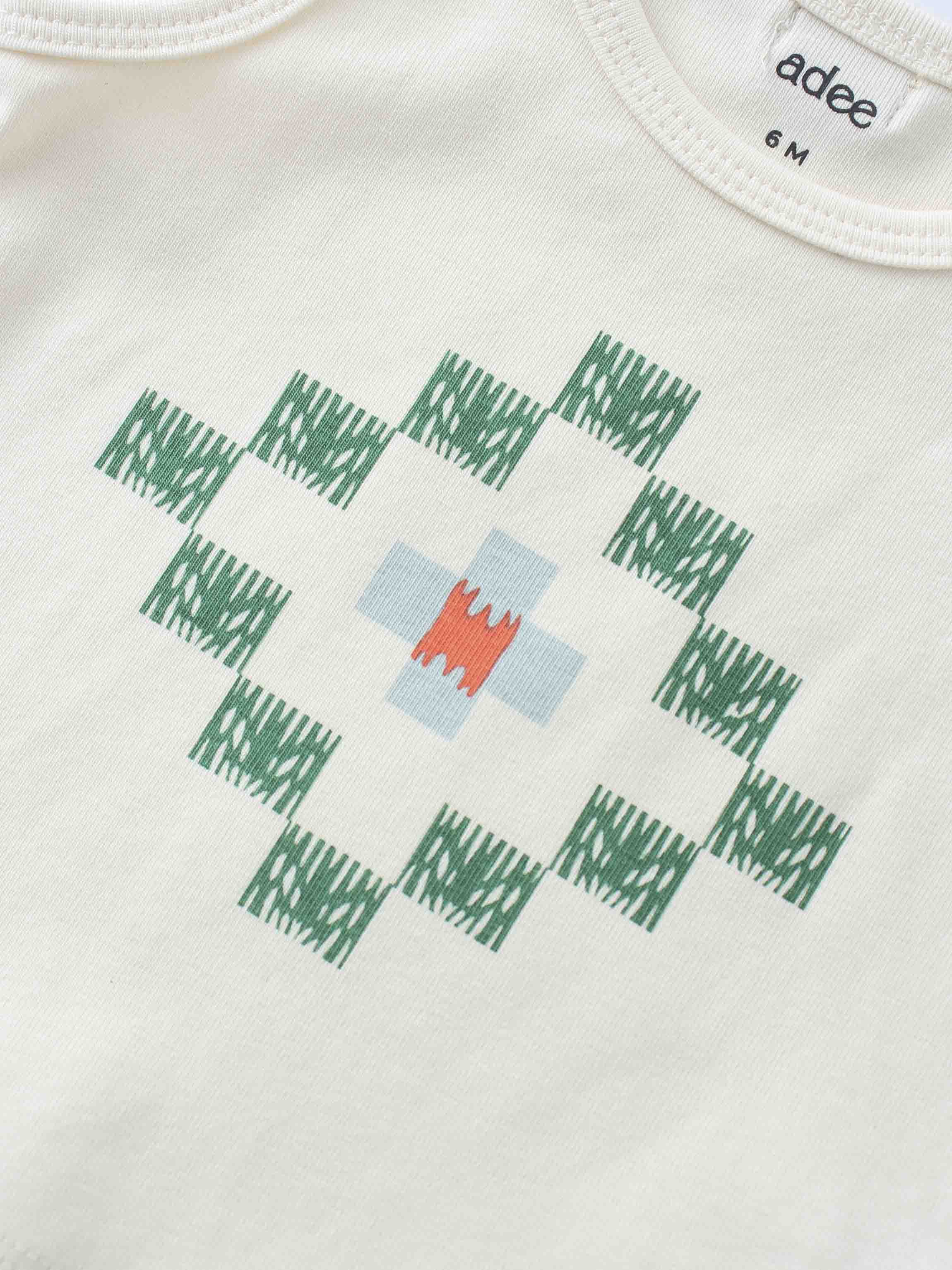 Green diamond pattern on tank top