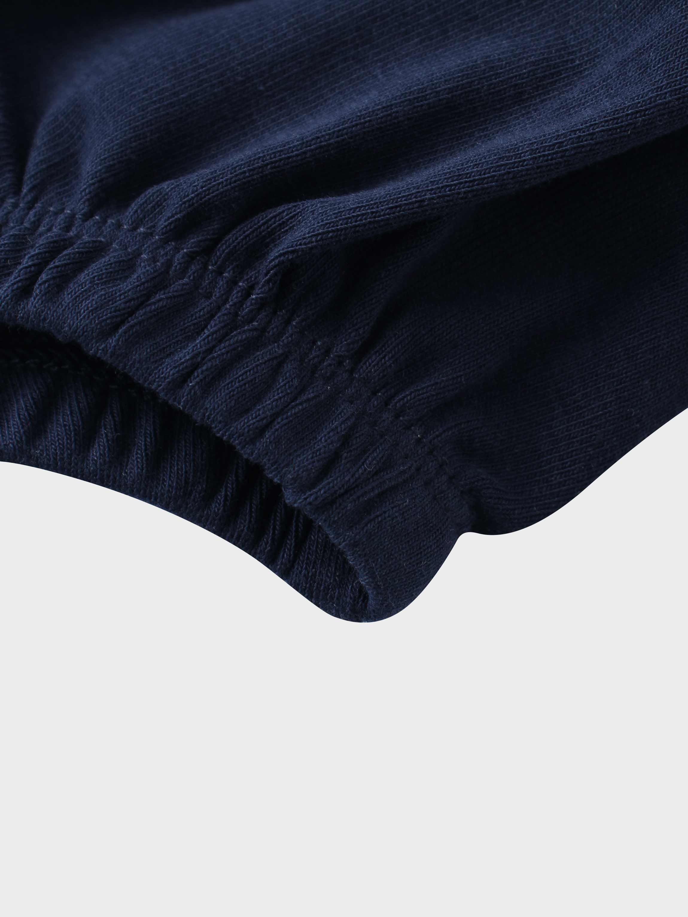 Navy blue baby romper leg detail