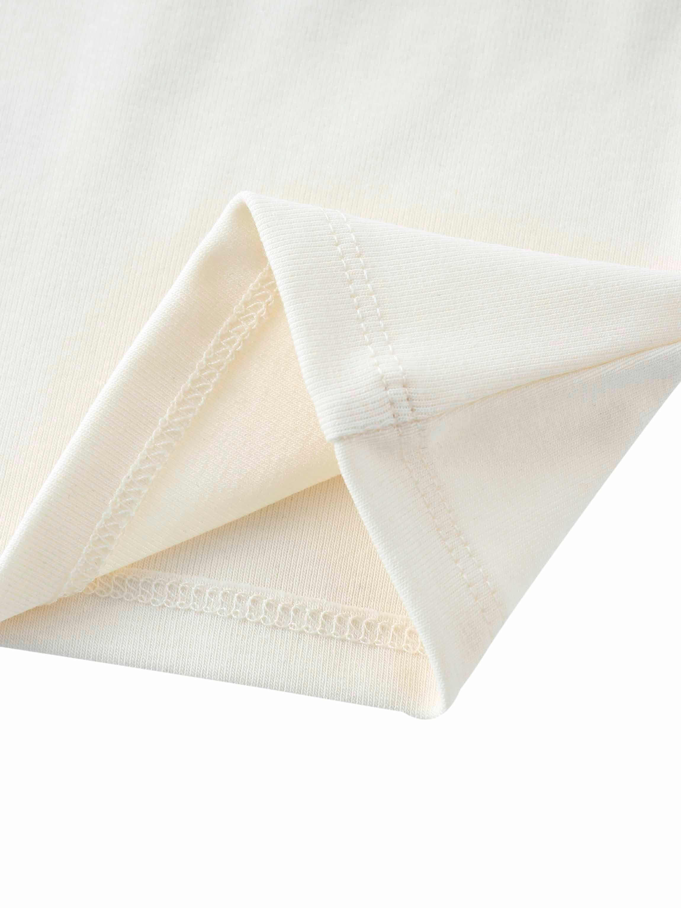 Close-up of off-white cotton fabric