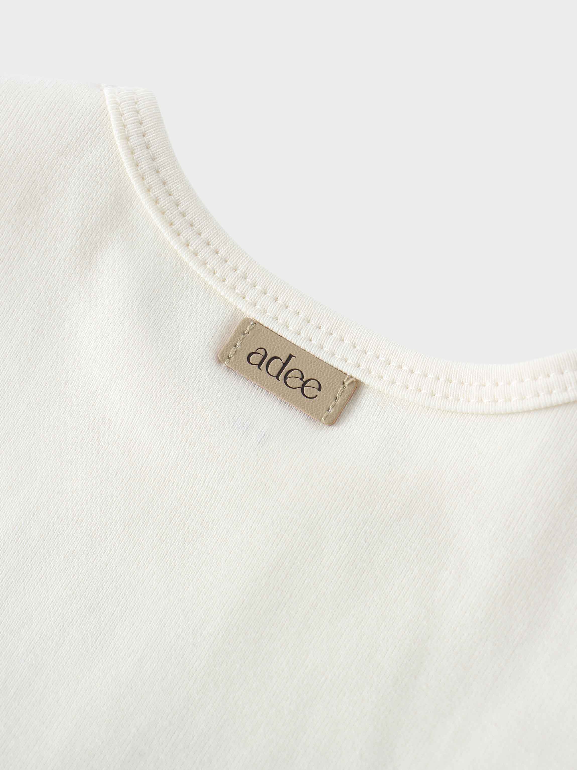 Baby tank top neckline tag