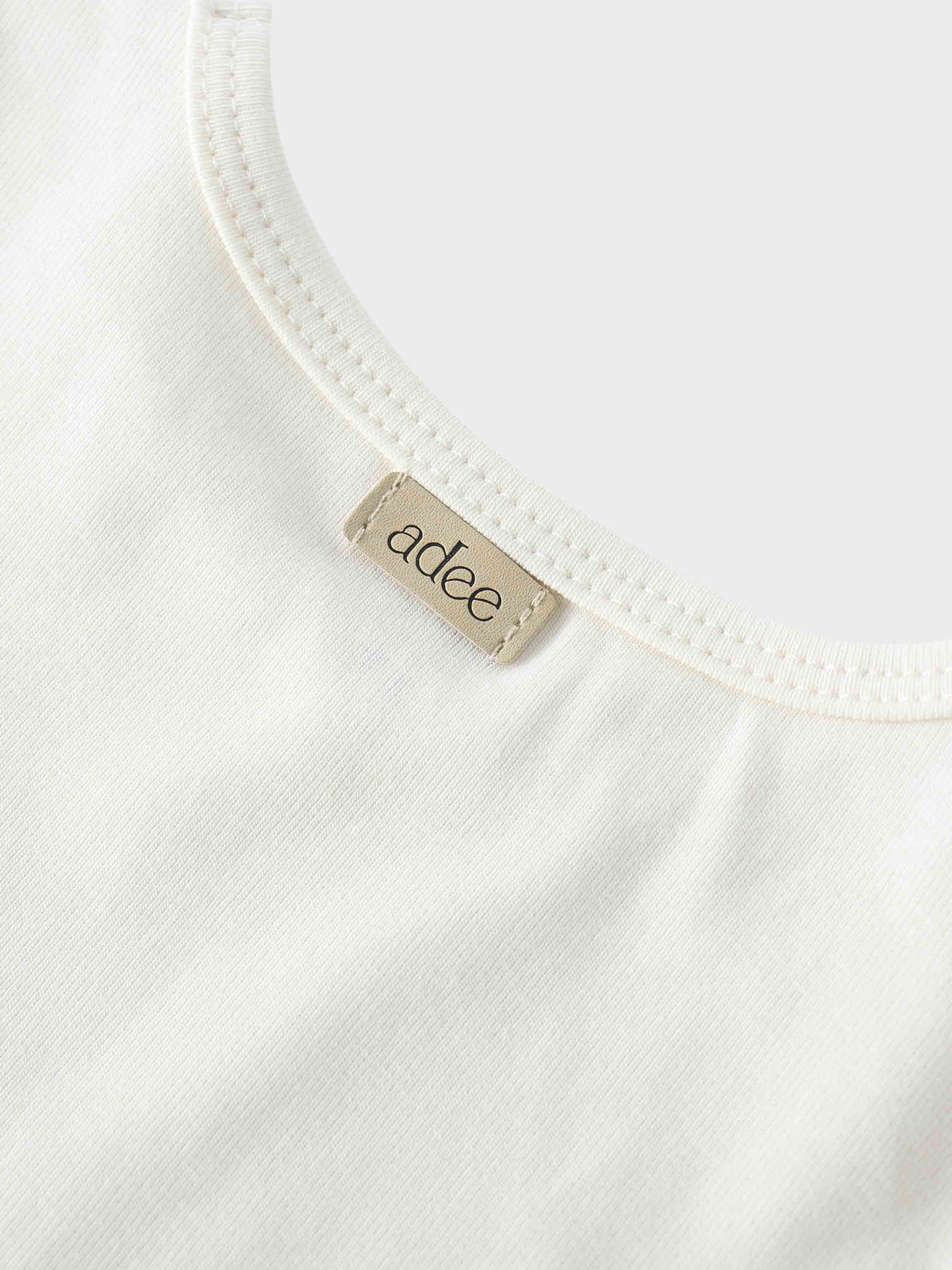 Close-up of off-white shirt