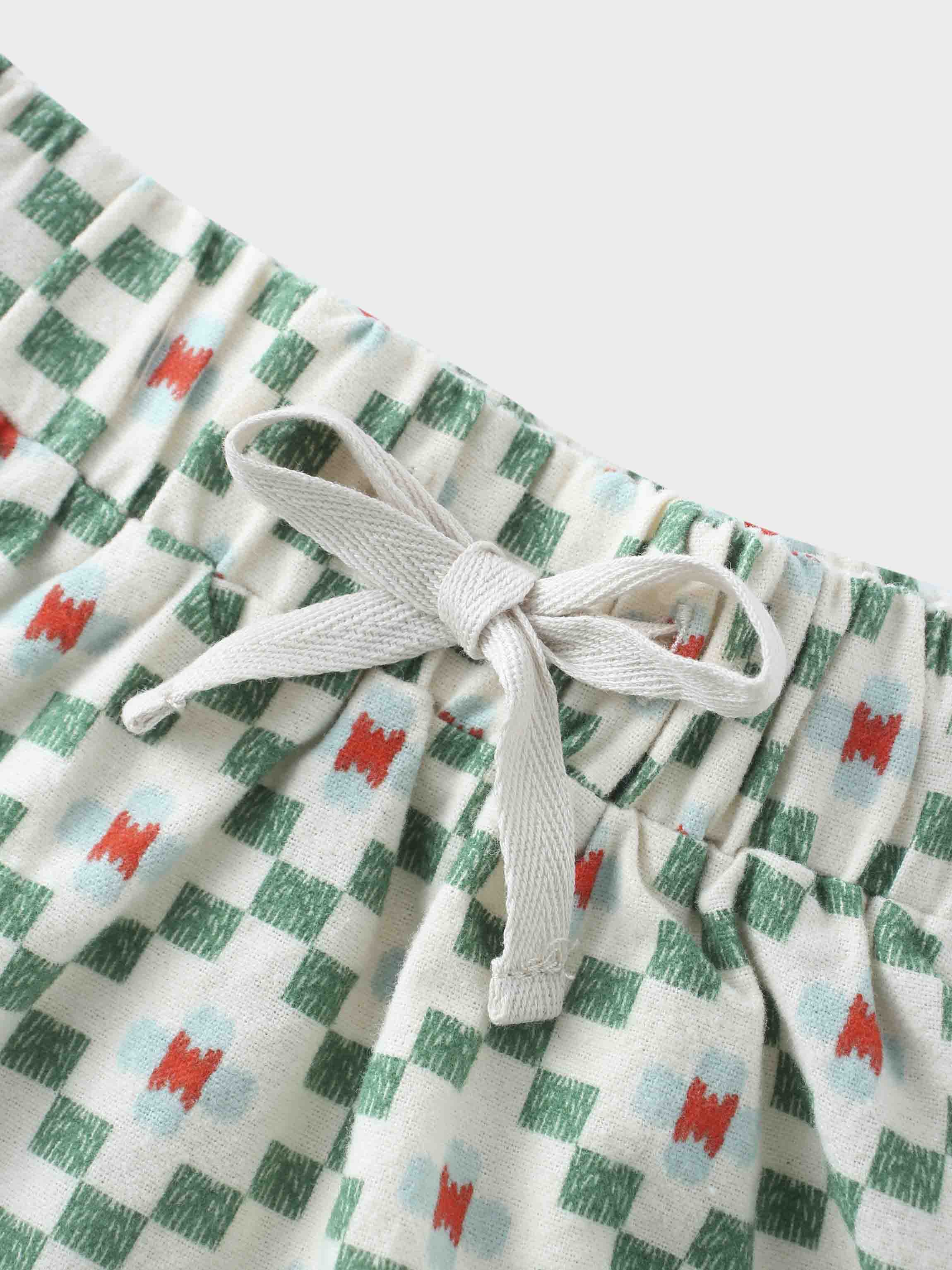 Green diamond skirt waistband detail