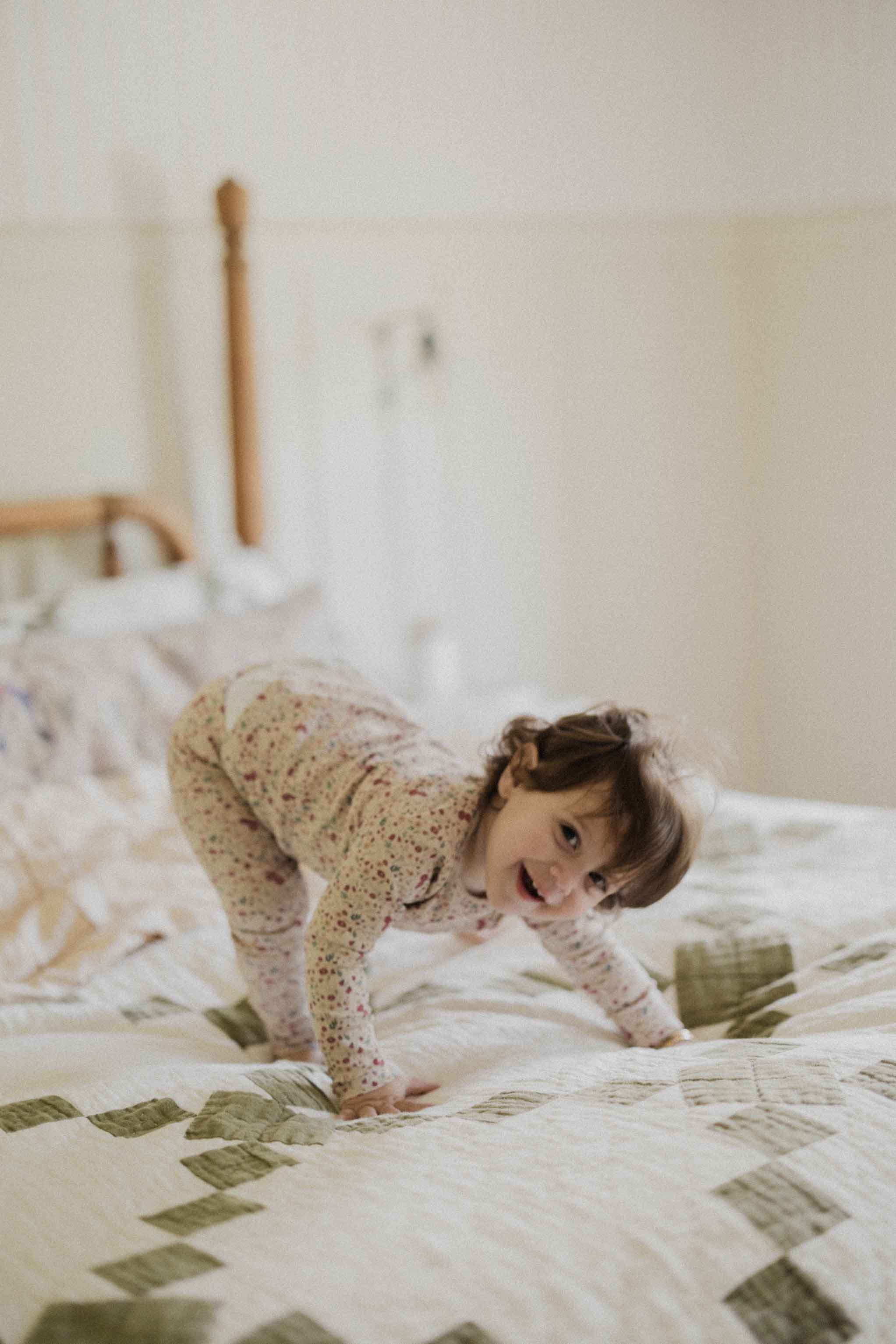 Playful girl in girls pajamas