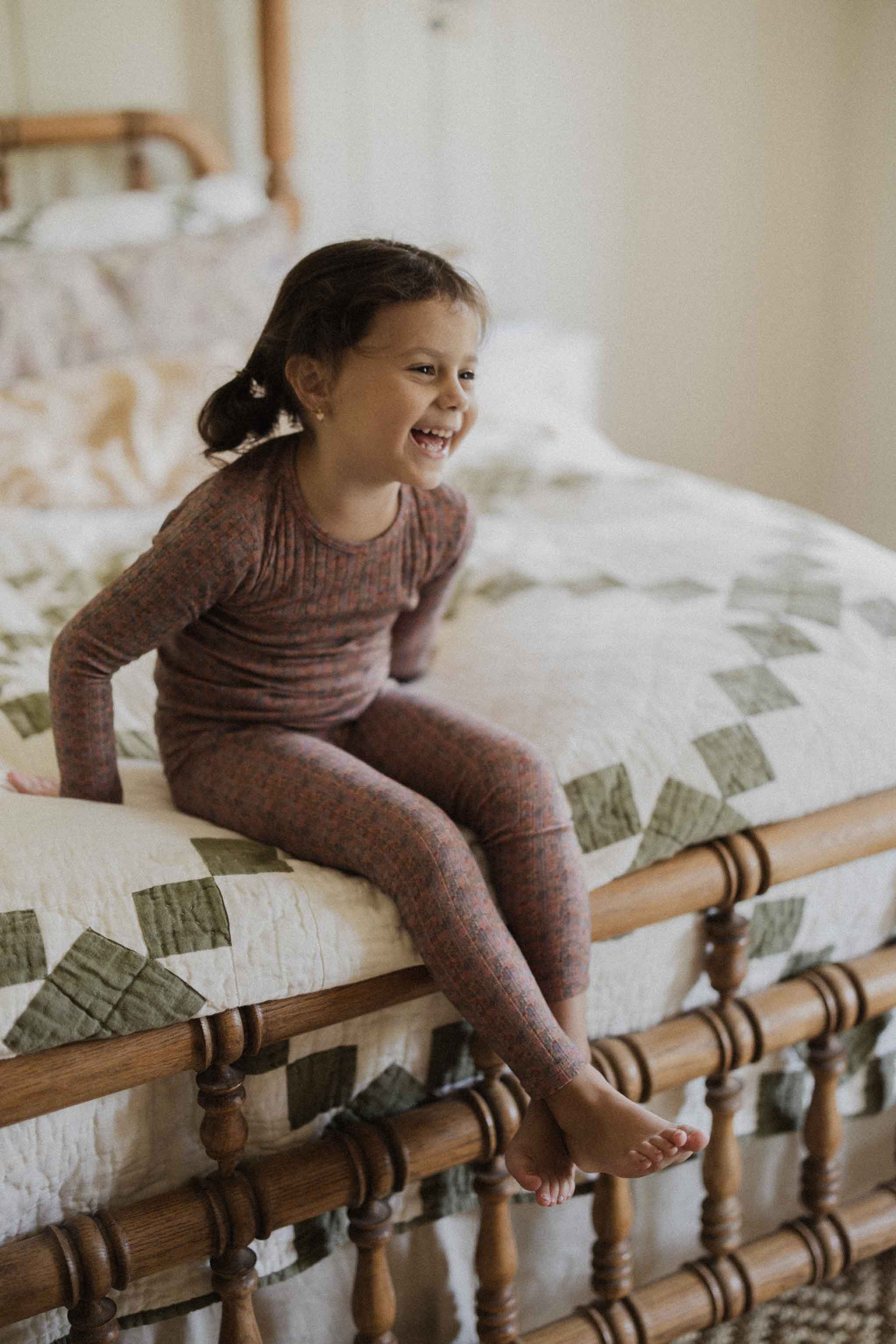 Happy girl in purple pajama