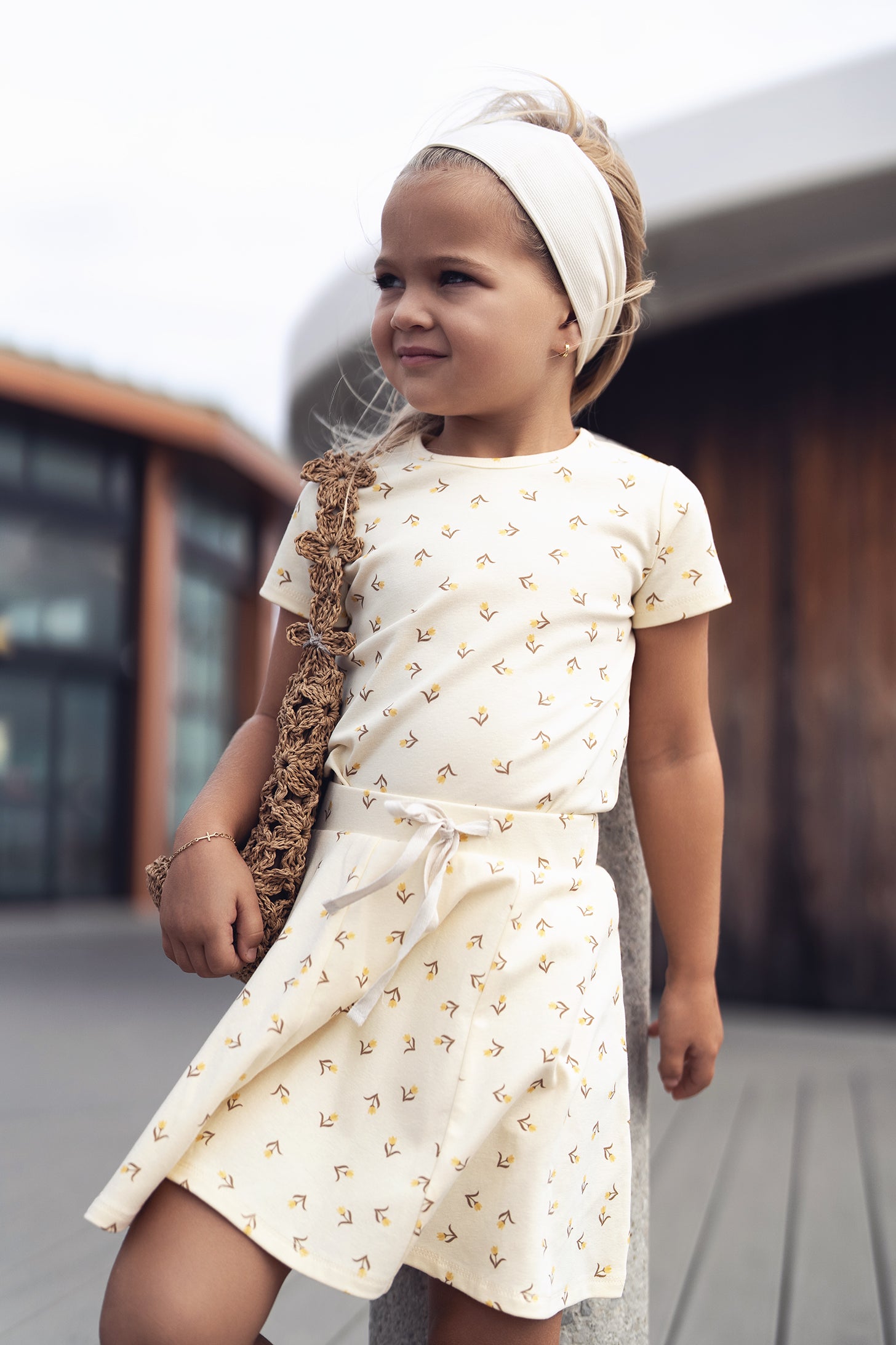 Butter yellow tulip T-shirt for girls with small floral print.