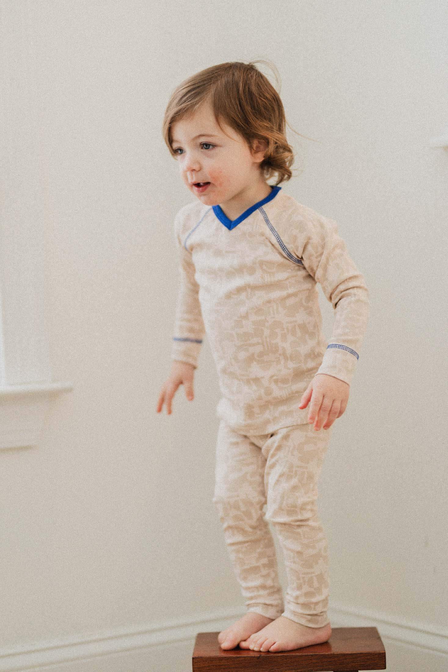Toddler in abstract blue pajamas