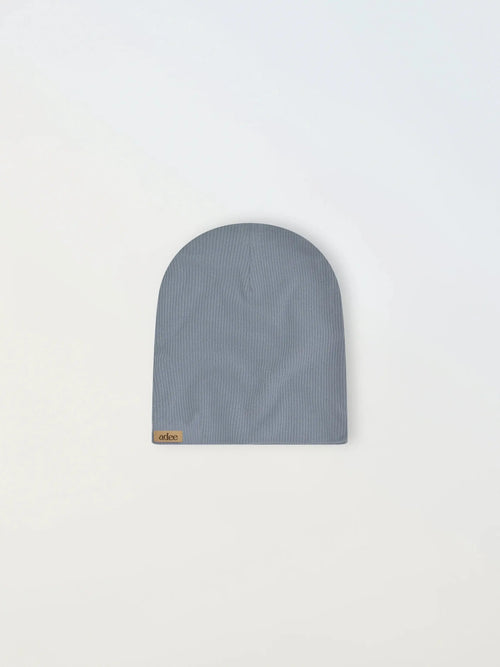 Light blue thin ribbed beanie for toddlers and baby boys; soft, breathable fabric for all-day warmth.