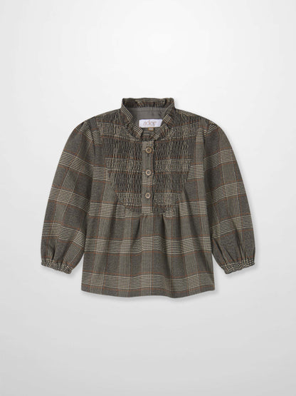 Plaid shirt for little girls in grey, Adee brand, button-front with brown buttons and puff sleeves.
