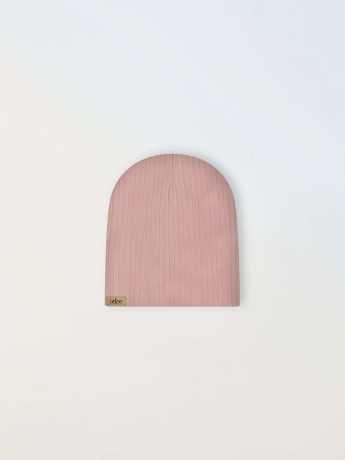 Wide ribbed pink girls beanie by Adee, with a small brand tag