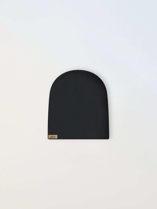 Thin ribbed black beanie by Adee; unisex apparel accessory