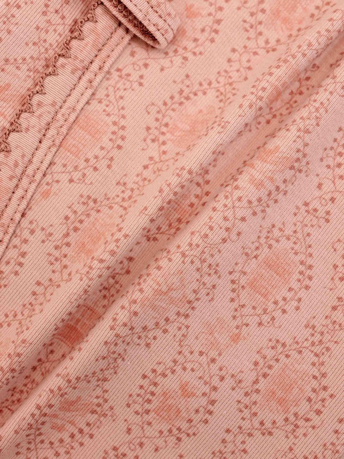 Pink Charm Stretchy girls stretchies by Adee with trailing vine print on soft pink fabric