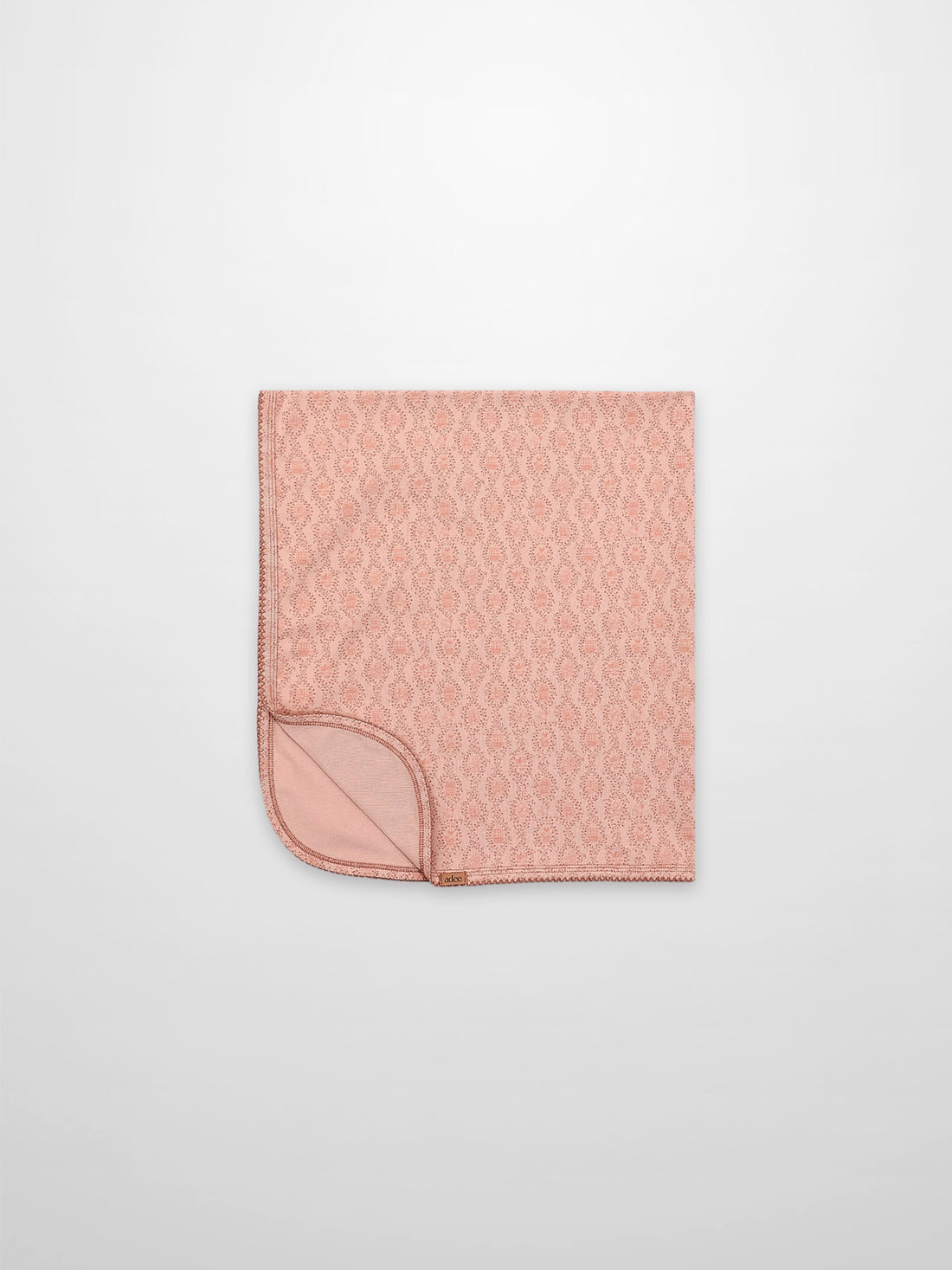 Pink Charm Blanket by Adee; light pink patterned receiving blanket for girls.