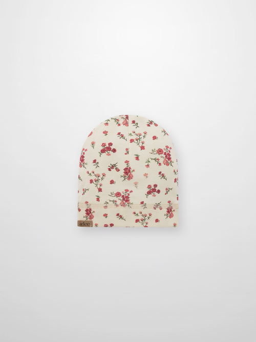 pink and red roses on a beanie hat for girls