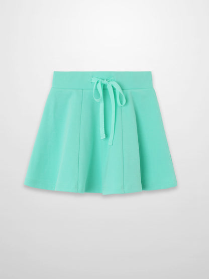 Mint green six-panel skirt with a drawstring waistband.
