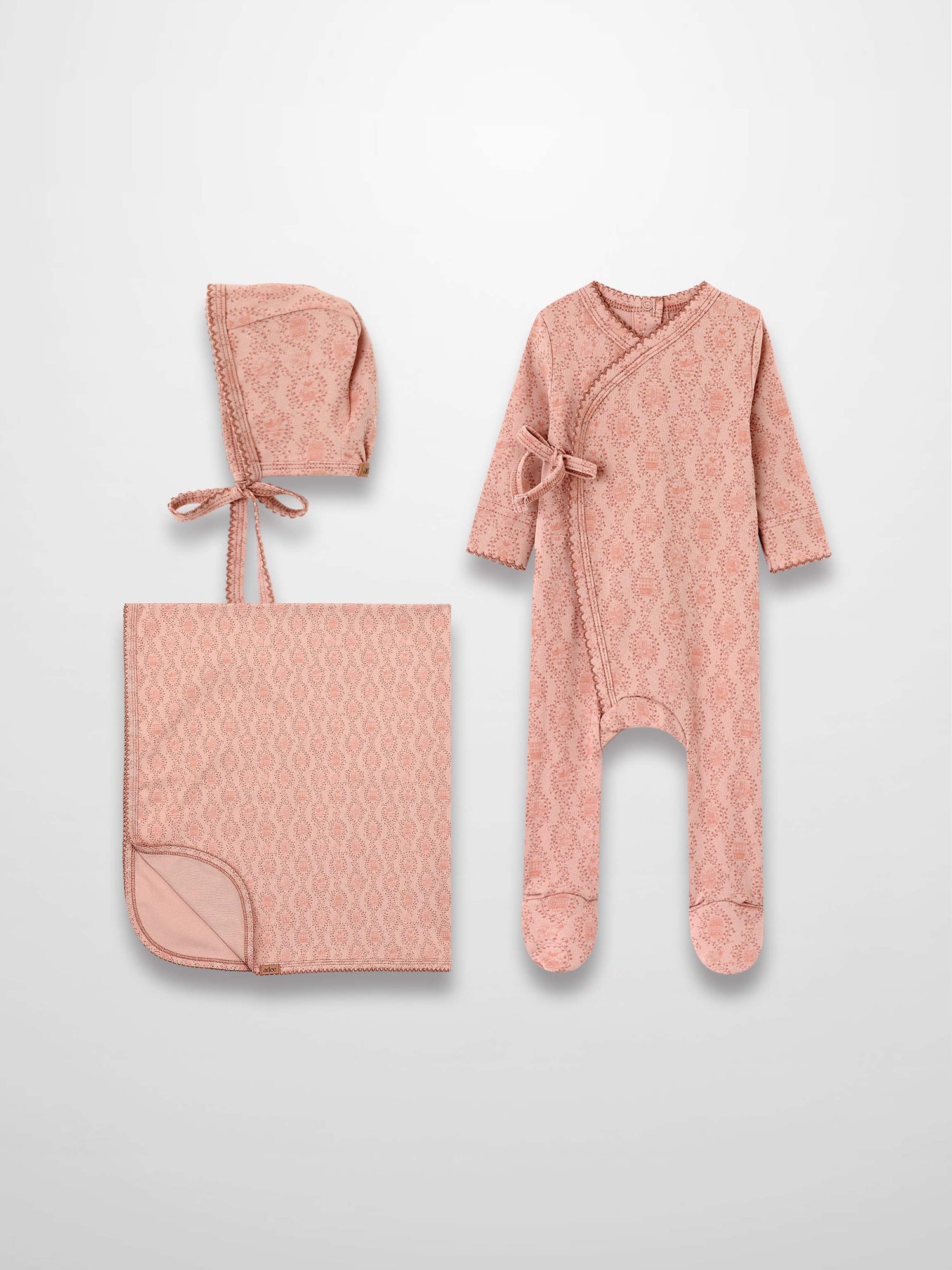 Pink Charm Layette Set by Adee; includes pink patterned hat, blanket, and footed romper.