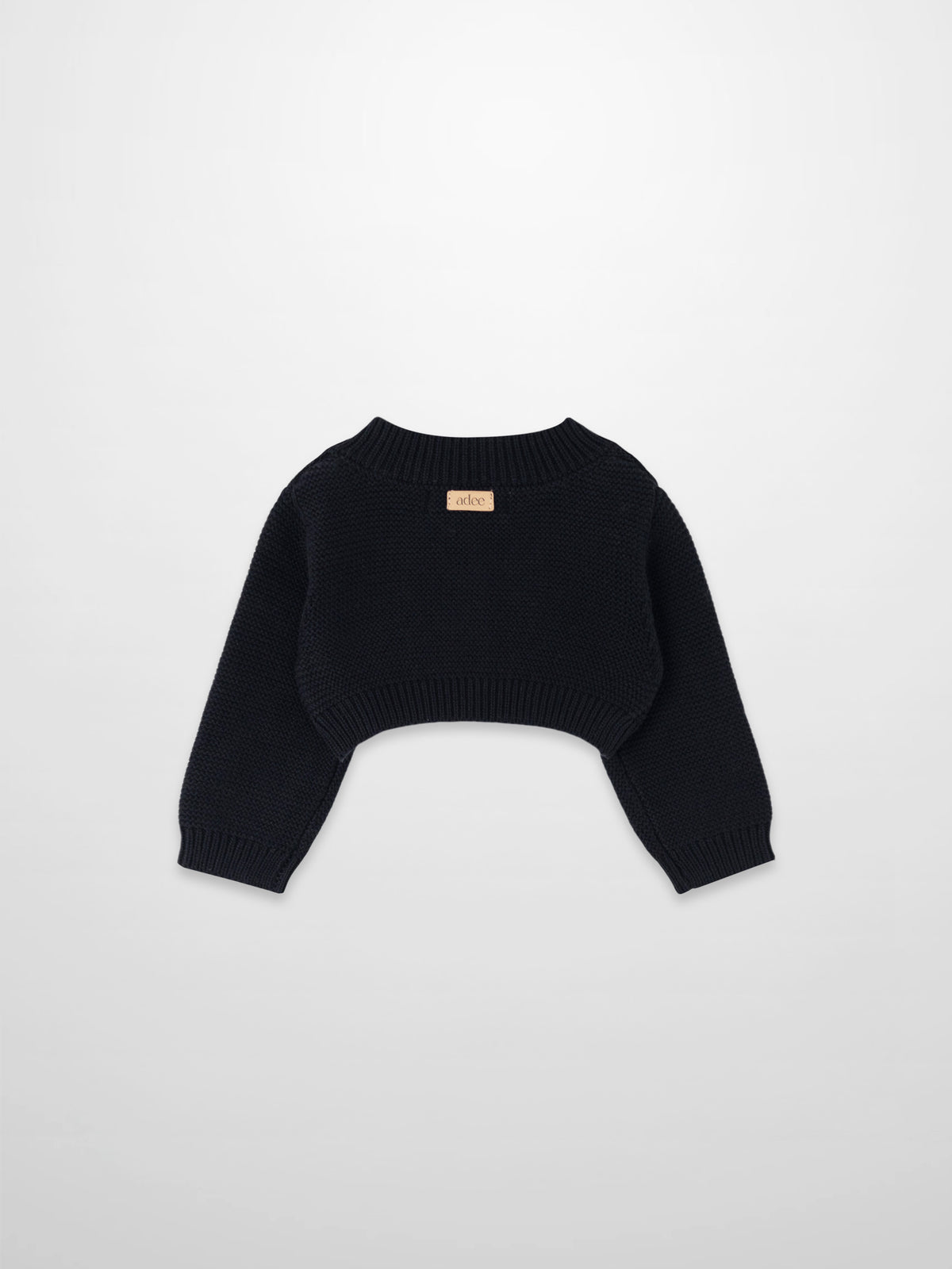 Cropped cardigan by Adee in black; unisex dressy knit top