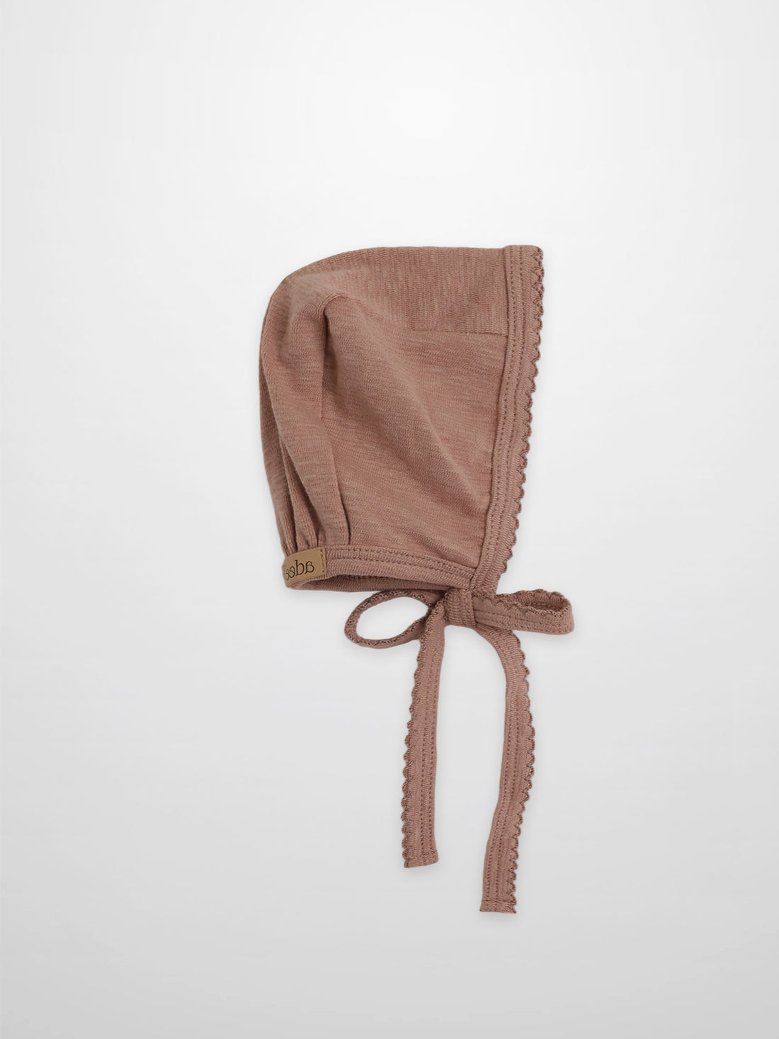 Pink Scalloped Bonnet for girls by Adee, dusty pink fabric with scalloped edge and tie strings.