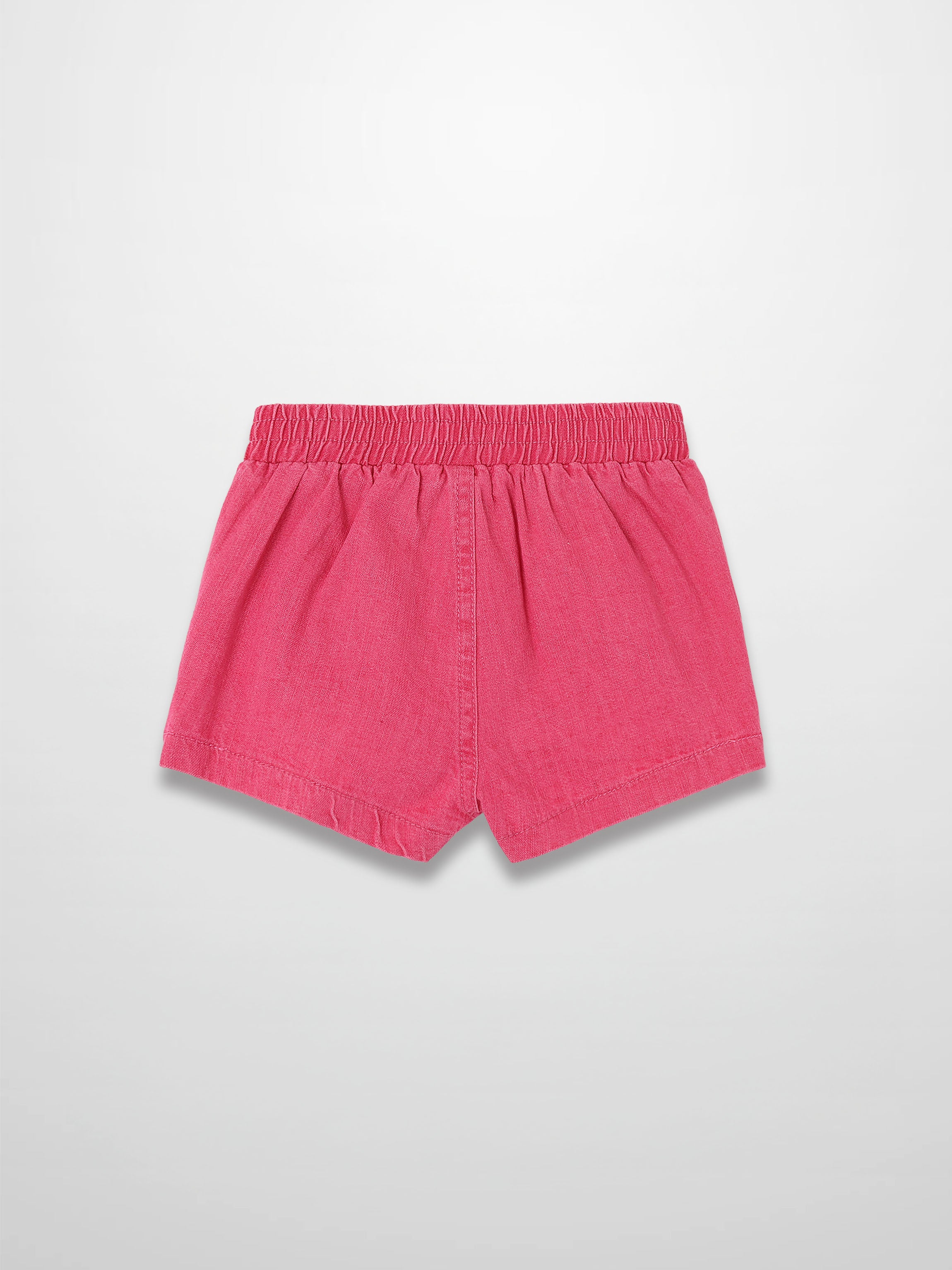 Paneled pink denim shorts with an elastic waistband.