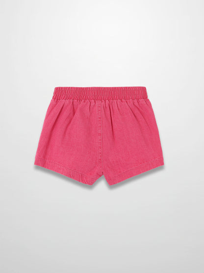 Paneled pink denim shorts with an elastic waistband.