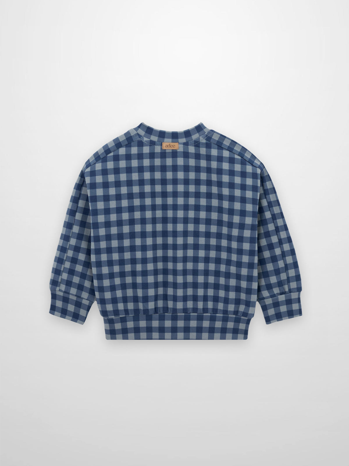 Blue gingham pajama top with long sleeves, ribbed cuffs and hem, back view.