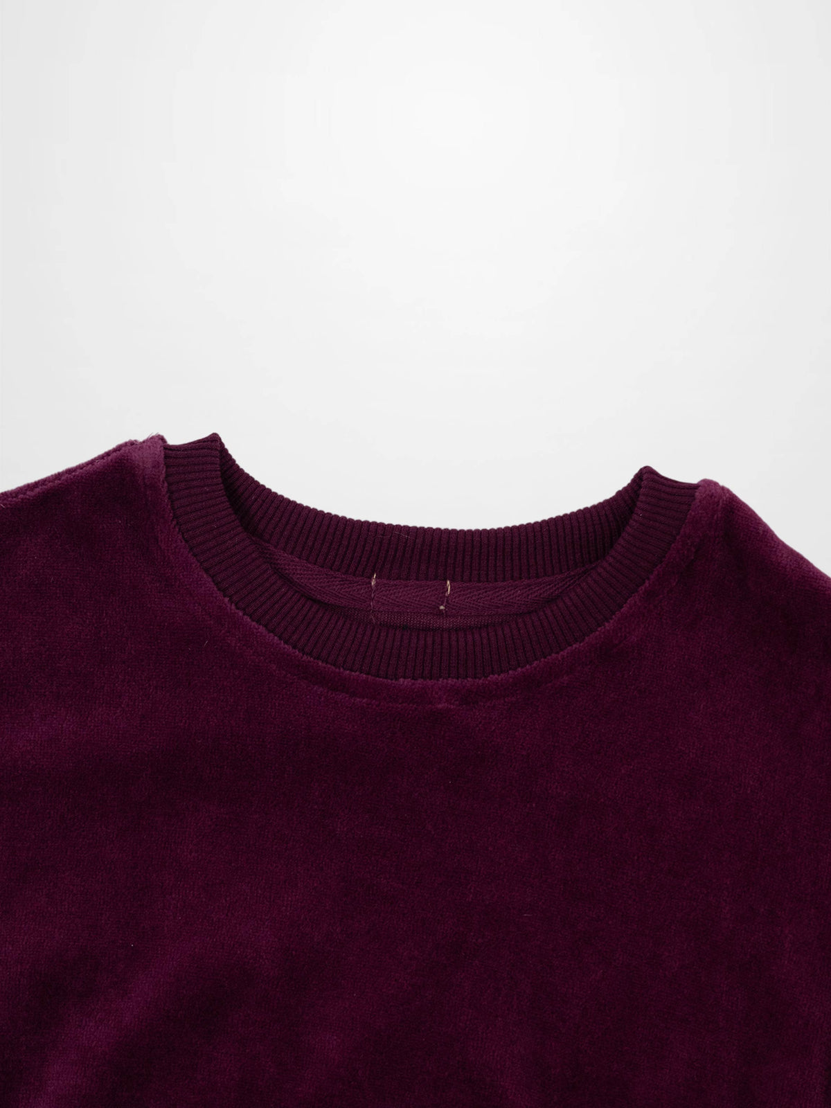 Velour Logo Set - Burgundy; unisex apparel in burgundy velour, crewneck close-up.
