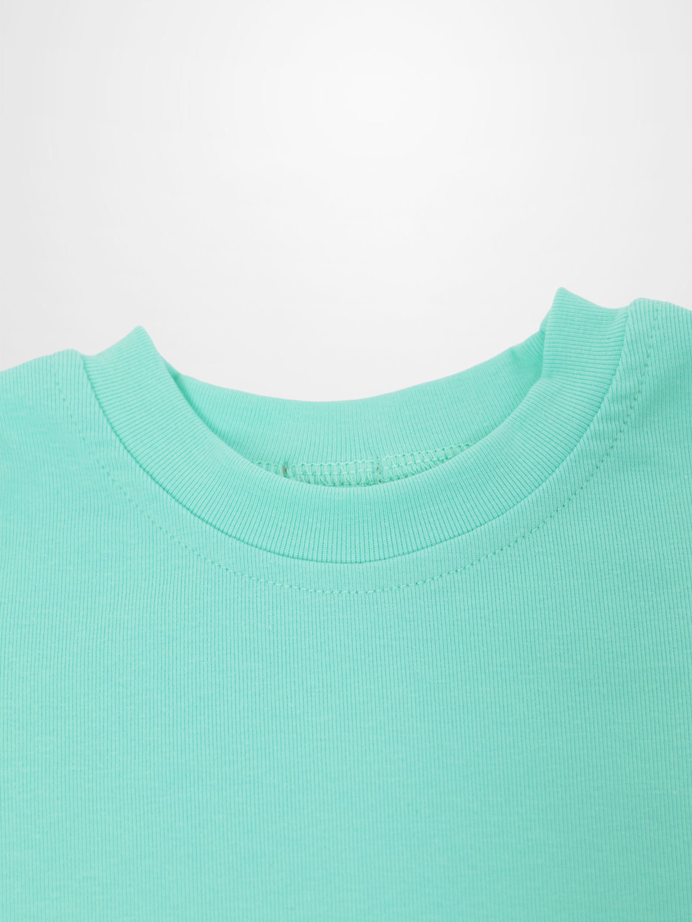 Short-sleeve boxy T-shirt for little boys in mint green.