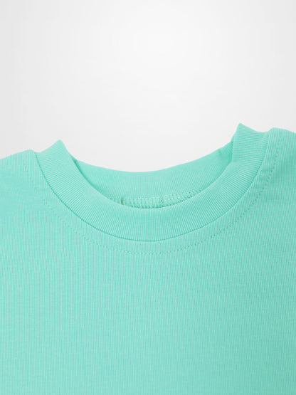 Short-sleeve boxy T-shirt for little boys in mint green.