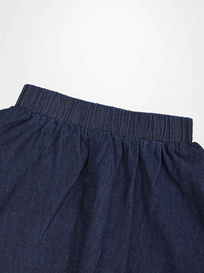 Circle skirt for girls in dark denim with an elastic waistband; thin fabric.