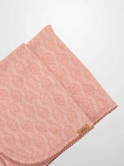 Pink Charm Blanket, light pink Adee receiving blanket with a scalloped edge.